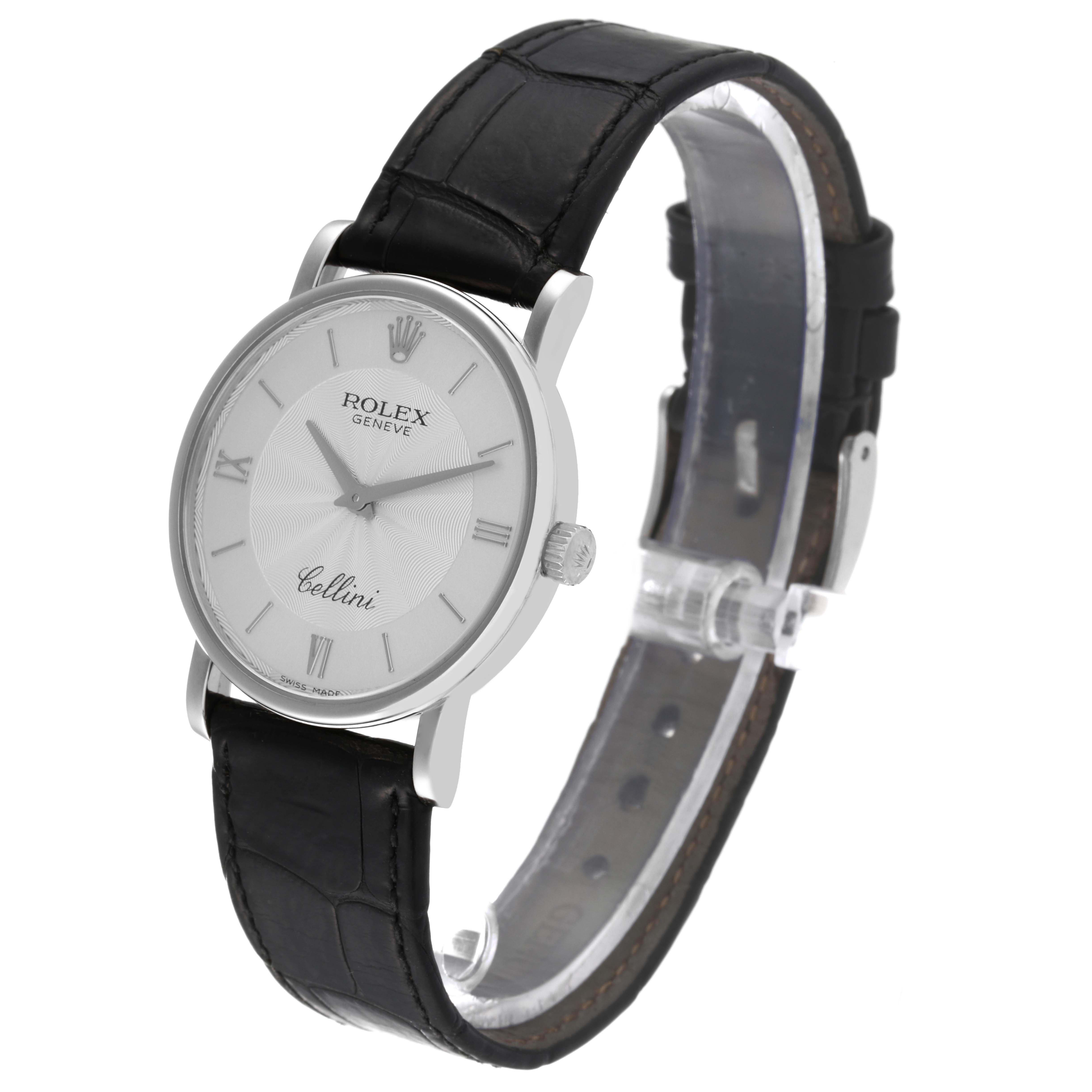 The Rolex Cellini 5115 Men's White Gold Silver Dial 5115 Men's White Gold Silver Dial watch is shown at an angle highlighting its face, crown, and black leather strap.