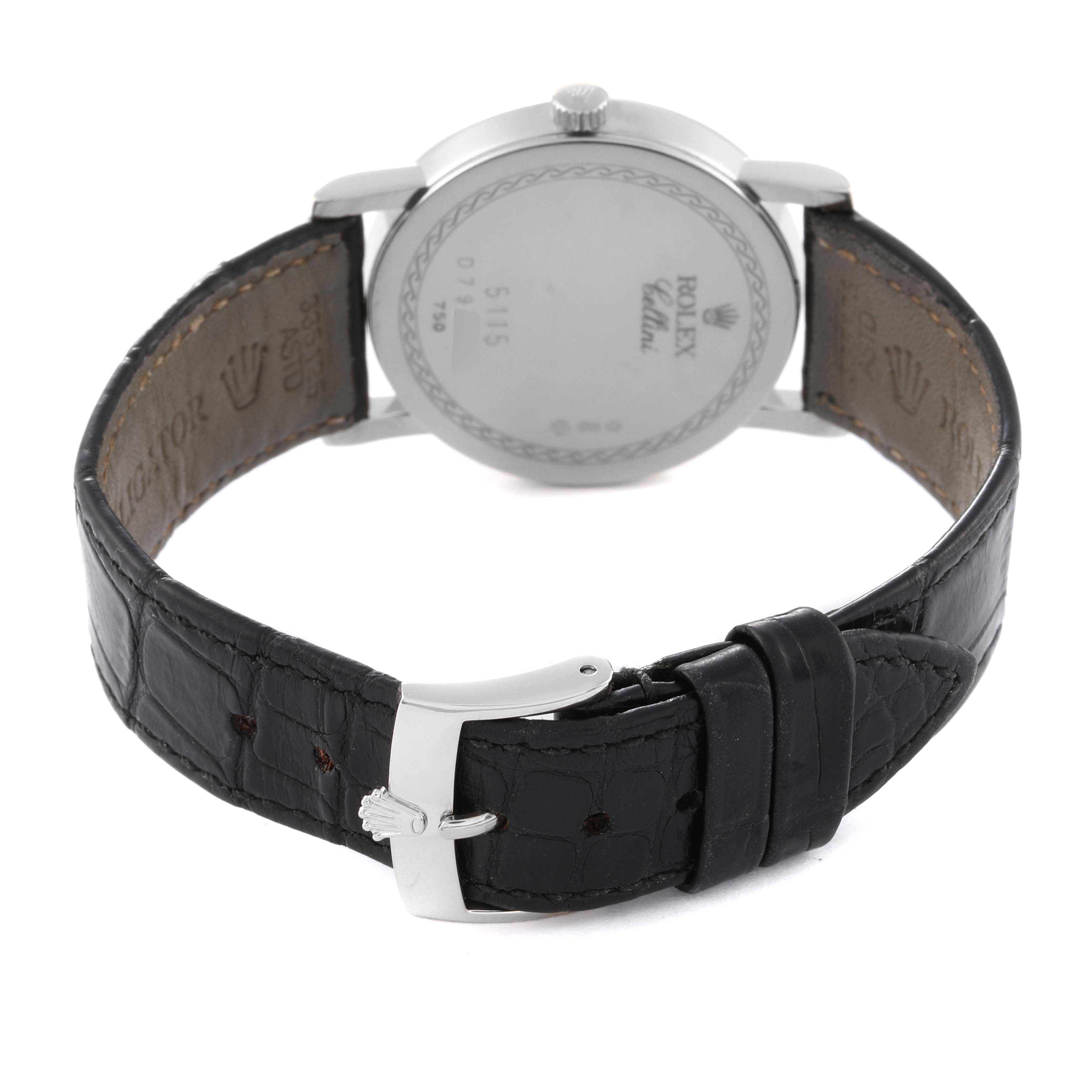 The image shows the back of a Rolex Cellini 5115 Men's White Gold Silver Dial 5115 Men's White Gold Silver Dial watch, highlighting the case back and black leather strap with a buckle.