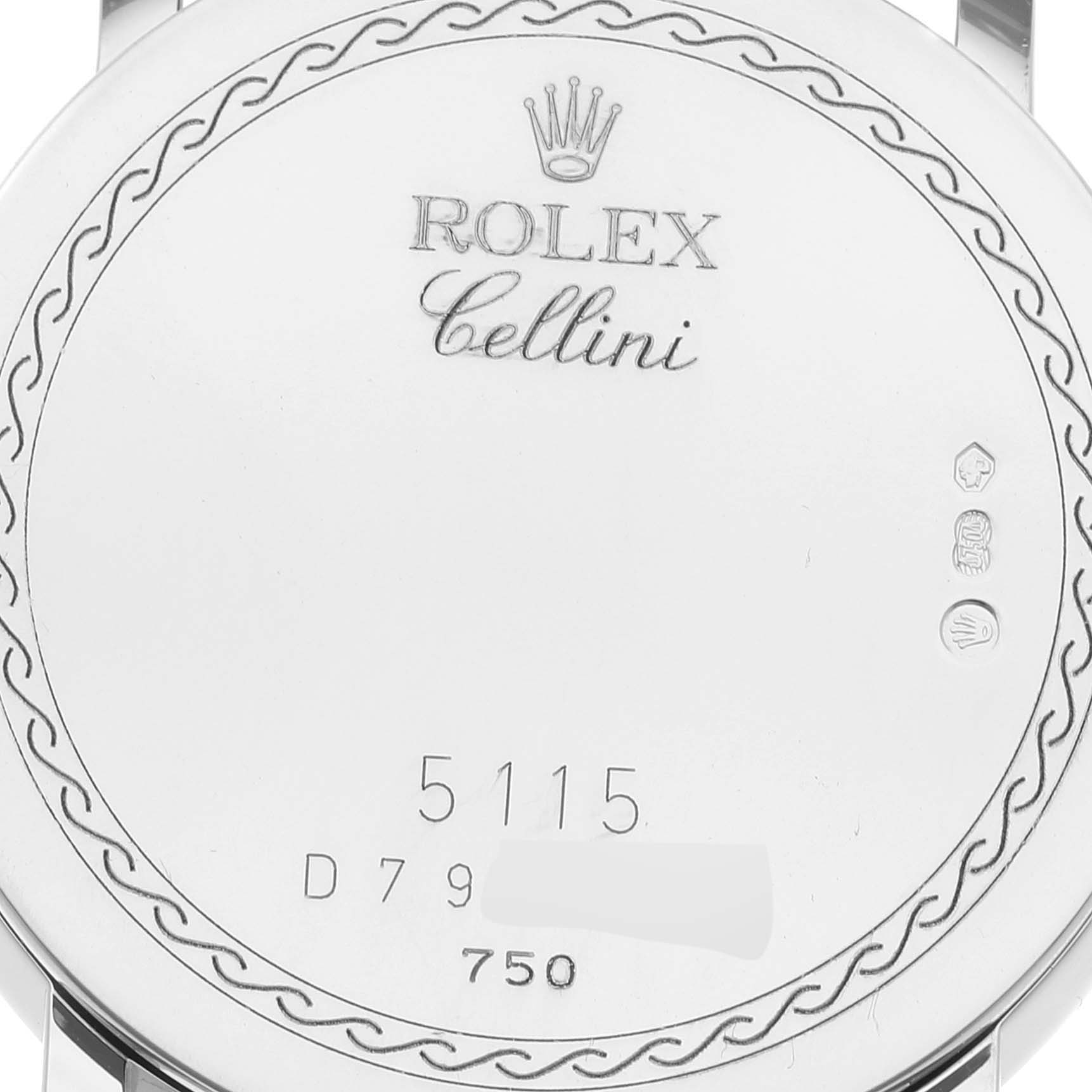 The image shows the back case of a Rolex Cellini 5115 Men's White Gold Silver Dial 5115 Men's White Gold Silver Dial model watch, engraved with its logo, serial number, and decorative pattern.