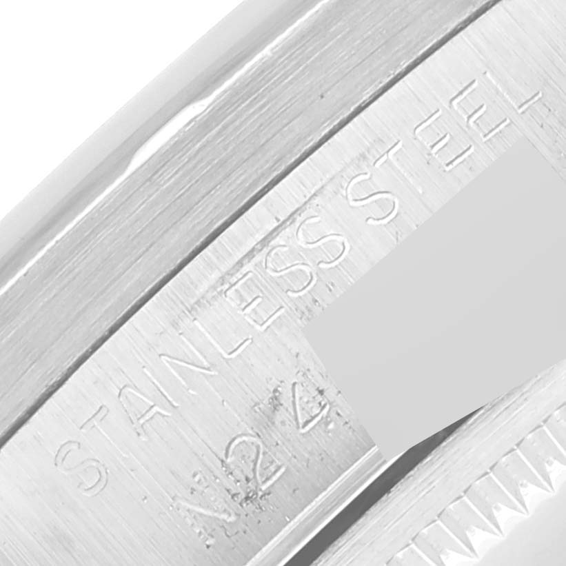 The image shows a close-up view of the stainless steel engraving and part of the bezel for the Rolex Date 15210 Men's Stainless Steel Black Dial 15210 Men's Stainless Steel Black Dial model watch.