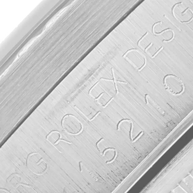 This is a close-up view of the case side engraving on a Rolex Date 15210 Men's Stainless Steel Black Dial 15210 Men's Stainless Steel Black Dial model watch.