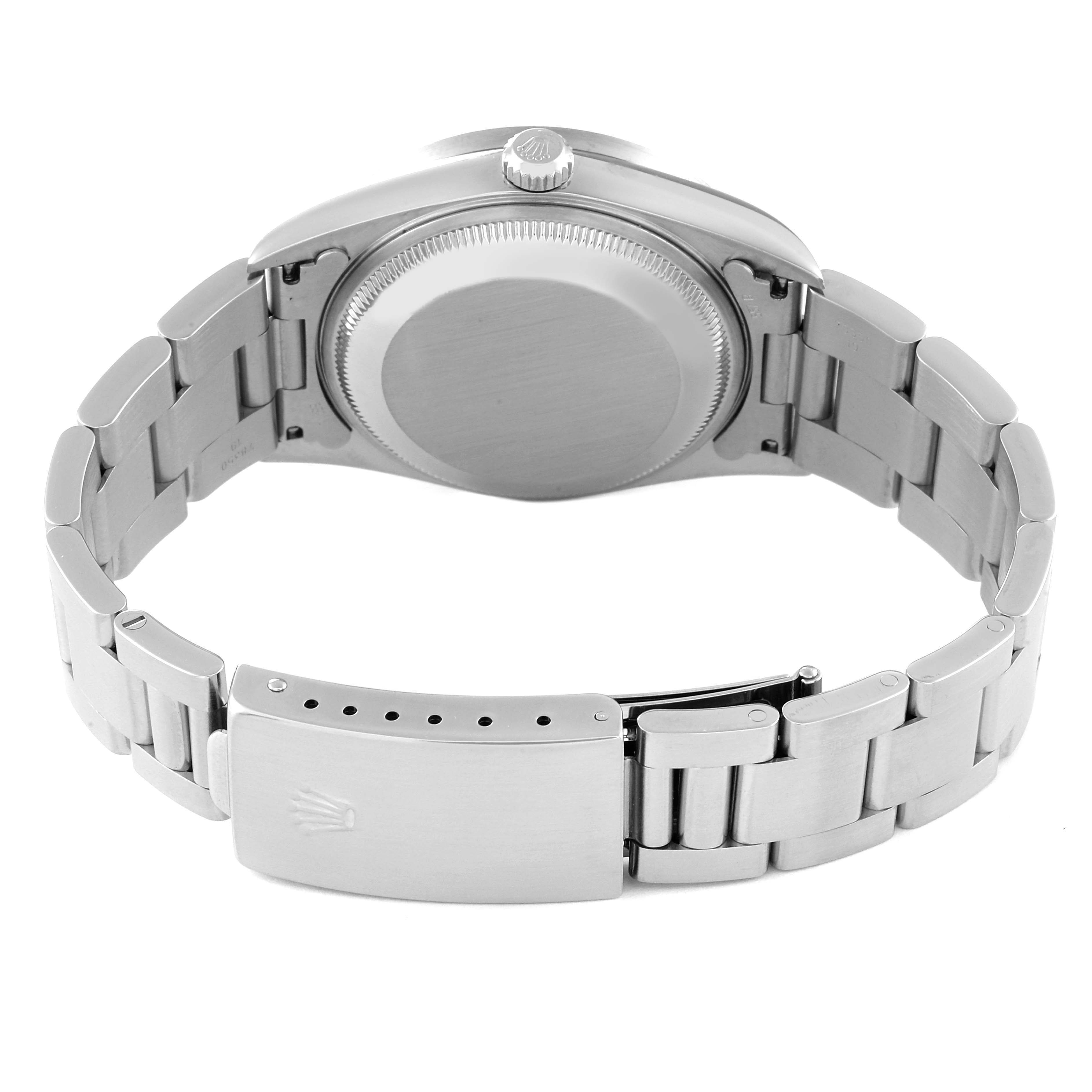 The image shows the back view of a Rolex Date 15210 Men
s Stainless Steel Black Dial 15210 Men
s Stainless Steel Black Dial model watch, highlighting the case back and bracelet clasp.