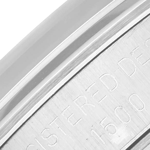 This image shows a close-up of the engraving on the case back of a Vintage Collection model by Rolex.