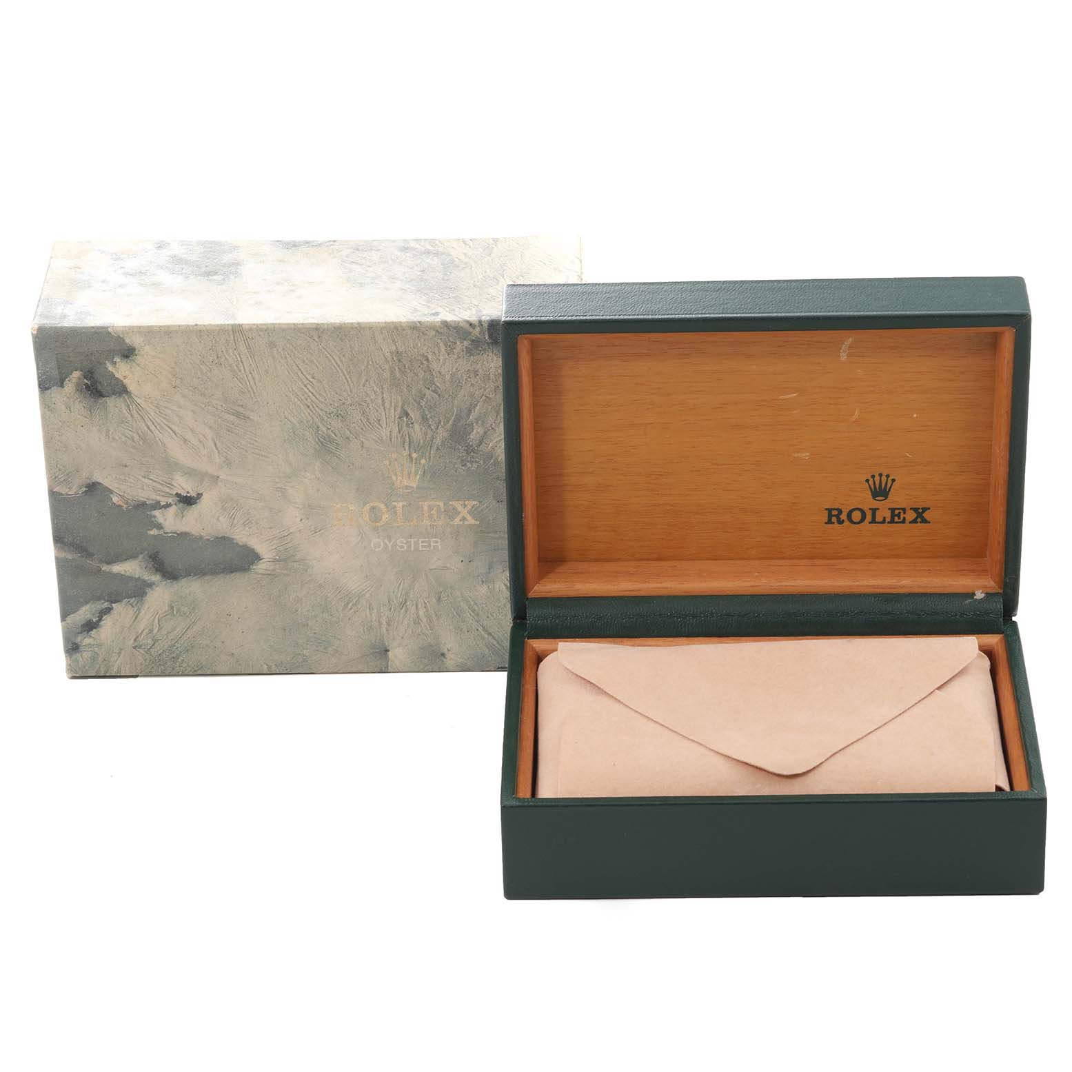 The image shows an open box and packaging for the Vintage Collection model by Rolex from a slightly above angle.