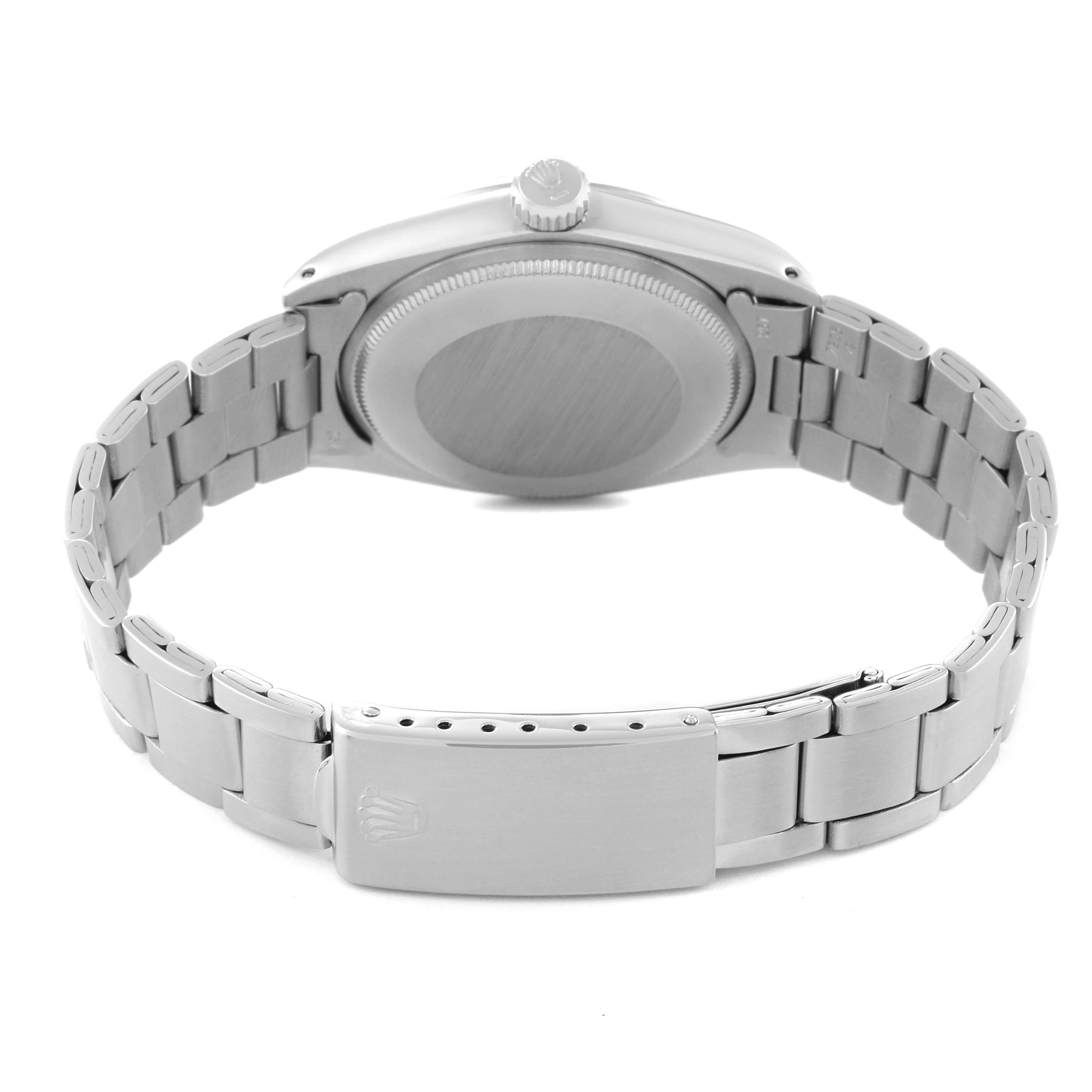 The image shows the backside of a Rolex Vintage Collection 1500 Men's Stainless Steel Silver Dial 1500 Men's Stainless Steel Silver Dial watch, including the case back, crown, and bracelet clasp.