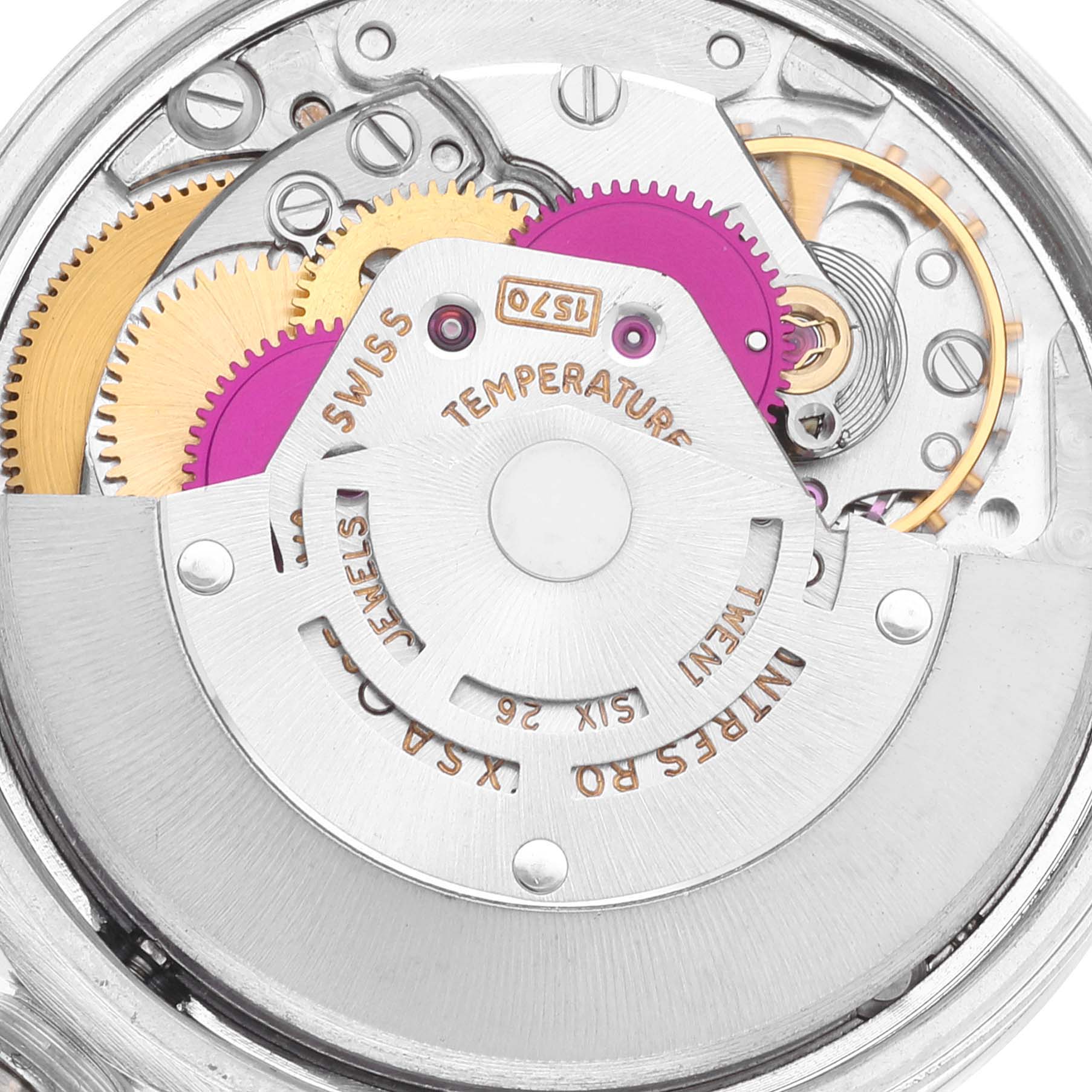 This is a close-up view of the internal mechanics of a Rolex Vintage Collection 1500 Men's Stainless Steel Silver Dial 1500 Men's Stainless Steel Silver Dial watch, showcasing gears and various components.
