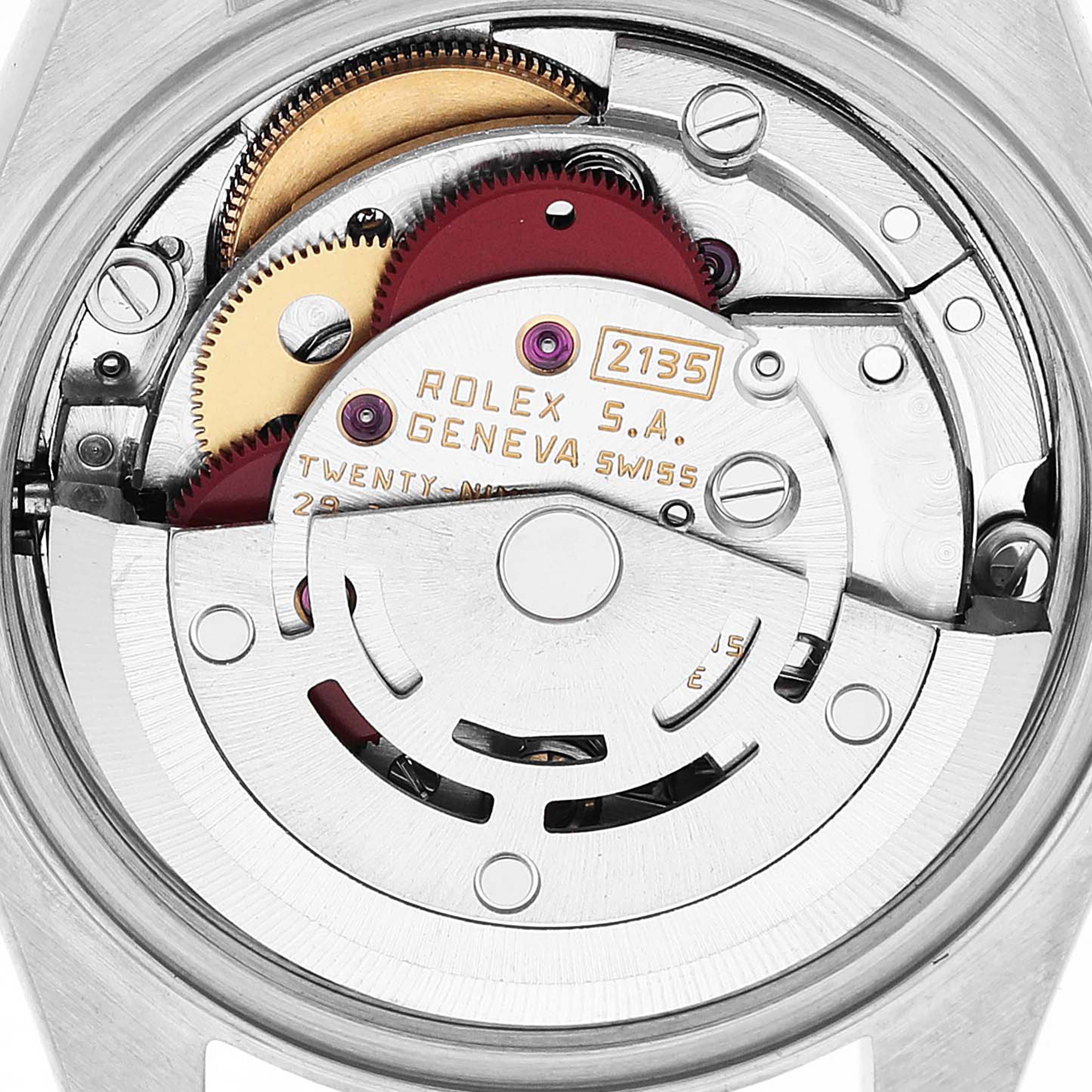 The image shows the movement of a Rolex Datejust 69173 Women's Stainless Steel Grey Dial, highlighting gears and engraved details.