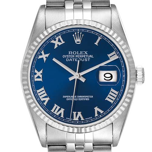 The image shows a front view of a Rolex Datejust watch, highlighting its blue dial, Roman numerals, fluted bezel, and date display.