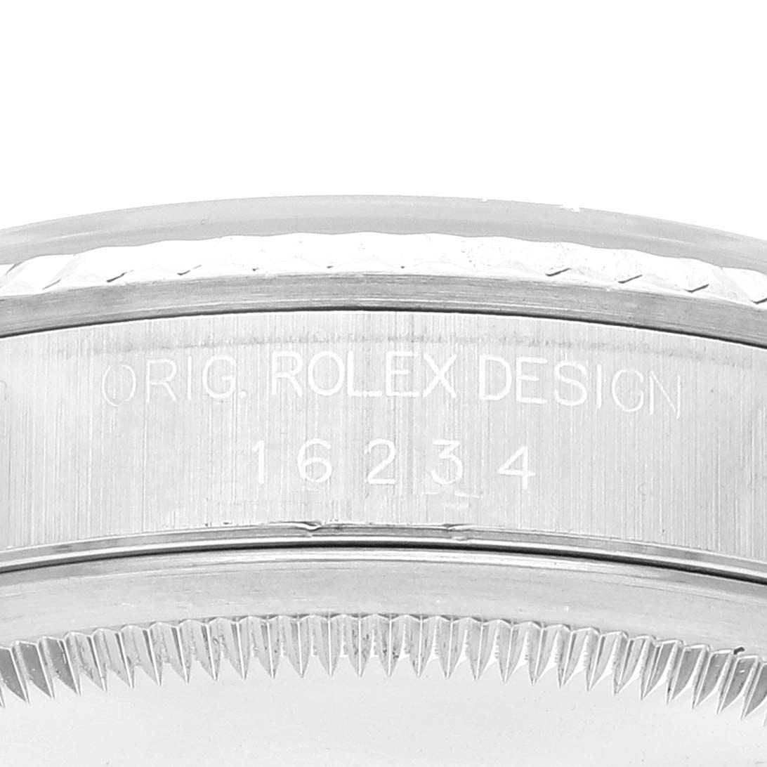 This image shows the case back and model number engraving of the Rolex Datejust 16234 Men's Stainless Steel Blue Dial 16234 Men's Stainless Steel Blue Dial watch.