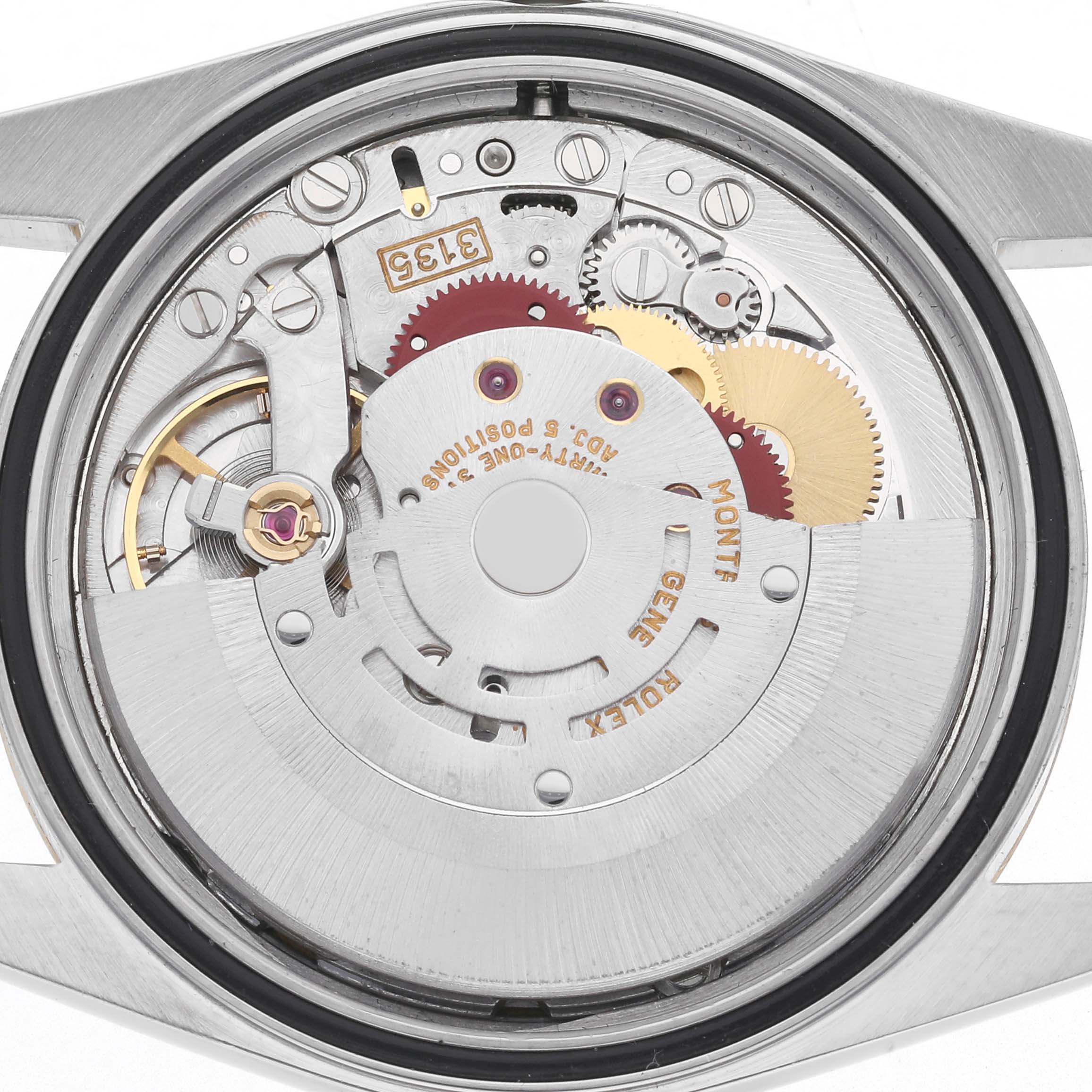 The image shows the movement of a Rolex Datejust model 16233 watch from the back, highlighting its intricate mechanism and components.