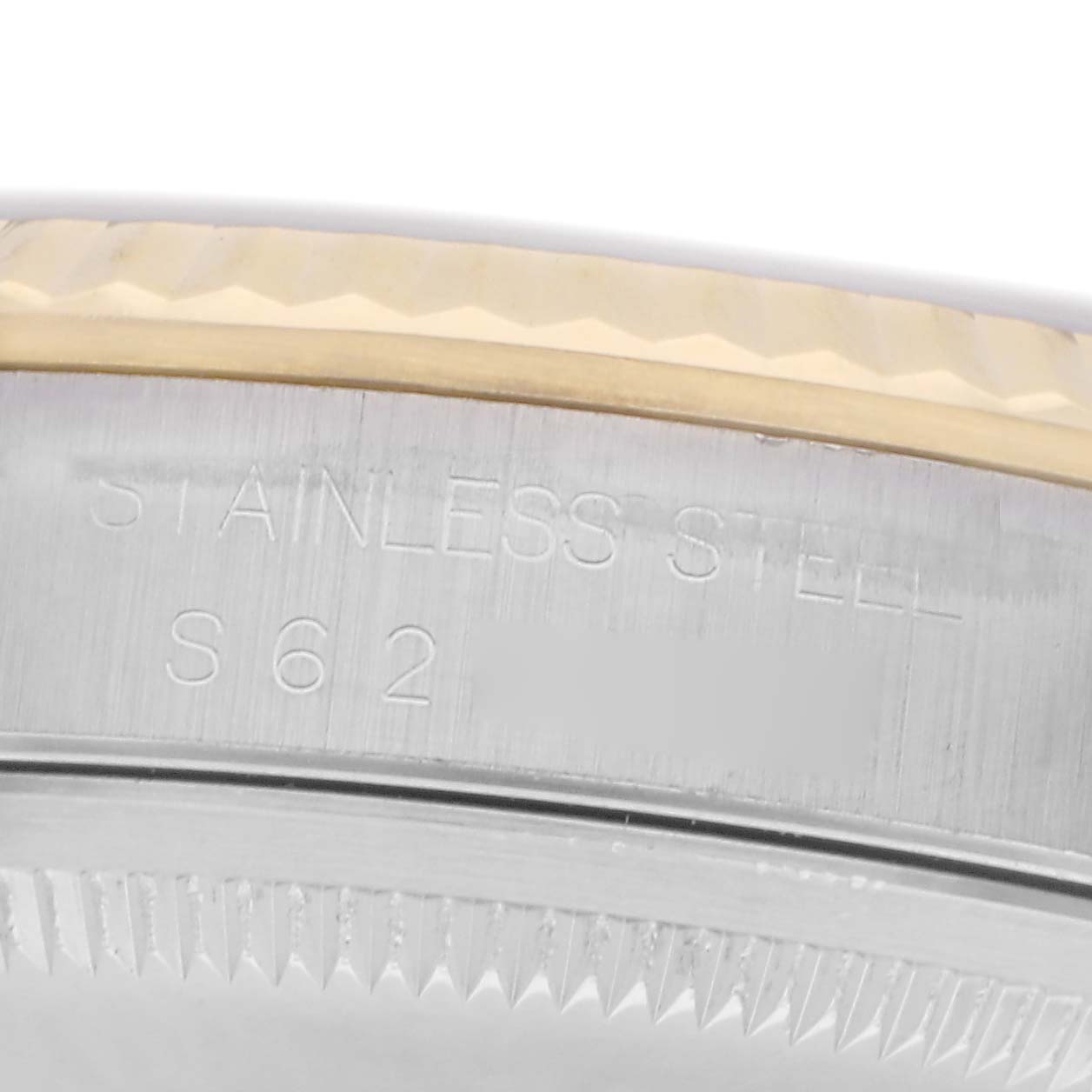 The image shows a close-up of the bezel and side of the Rolex Datejust 16233 men's watch, highlighting the stainless steel and engraved markings.