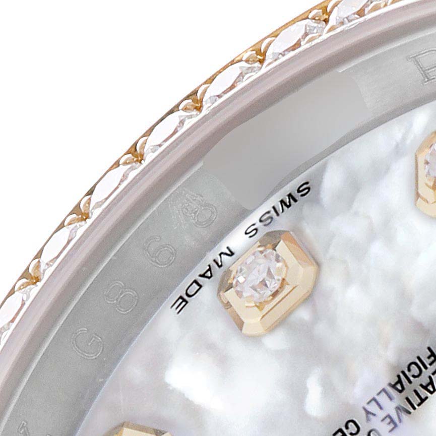 The image shows a close-up of the Rolex Datejust model 116243, highlighting the diamond-studded bezel and part of the dial with gem-set hour markers.