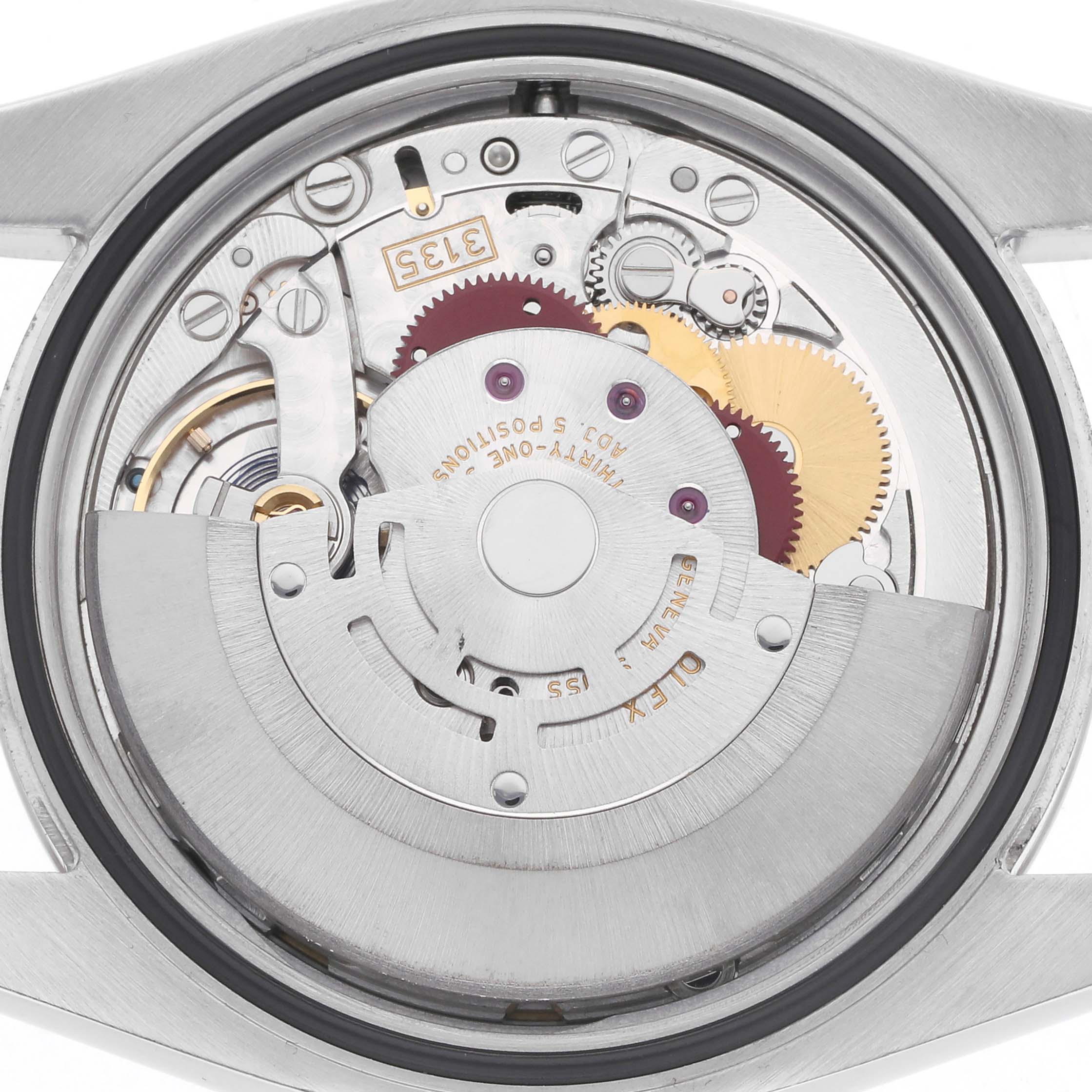 The image shows the movement mechanism of the Rolex Datejust model 116234 men's watch from a back angle, highlighting gears and intricate components.