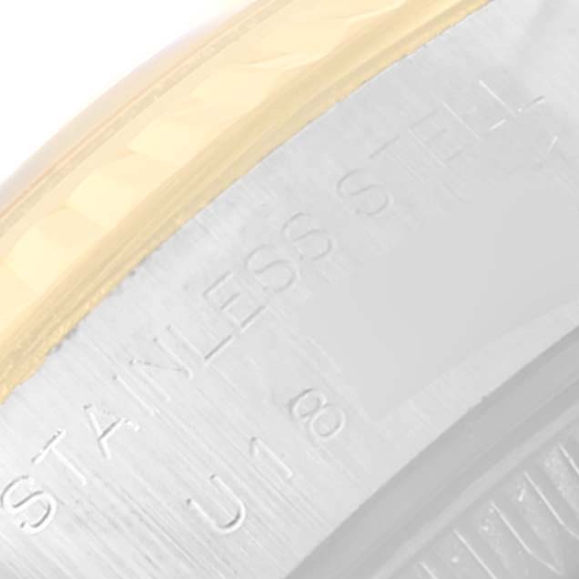 The image shows a close-up of the bezel and case side of a Rolex Datejust 69173 Women's Steel and Gold (two tone) Blue Dial 69173 Women's Steel and Gold (two tone) Blue Dial, highlighting the stainless steel and gold components.