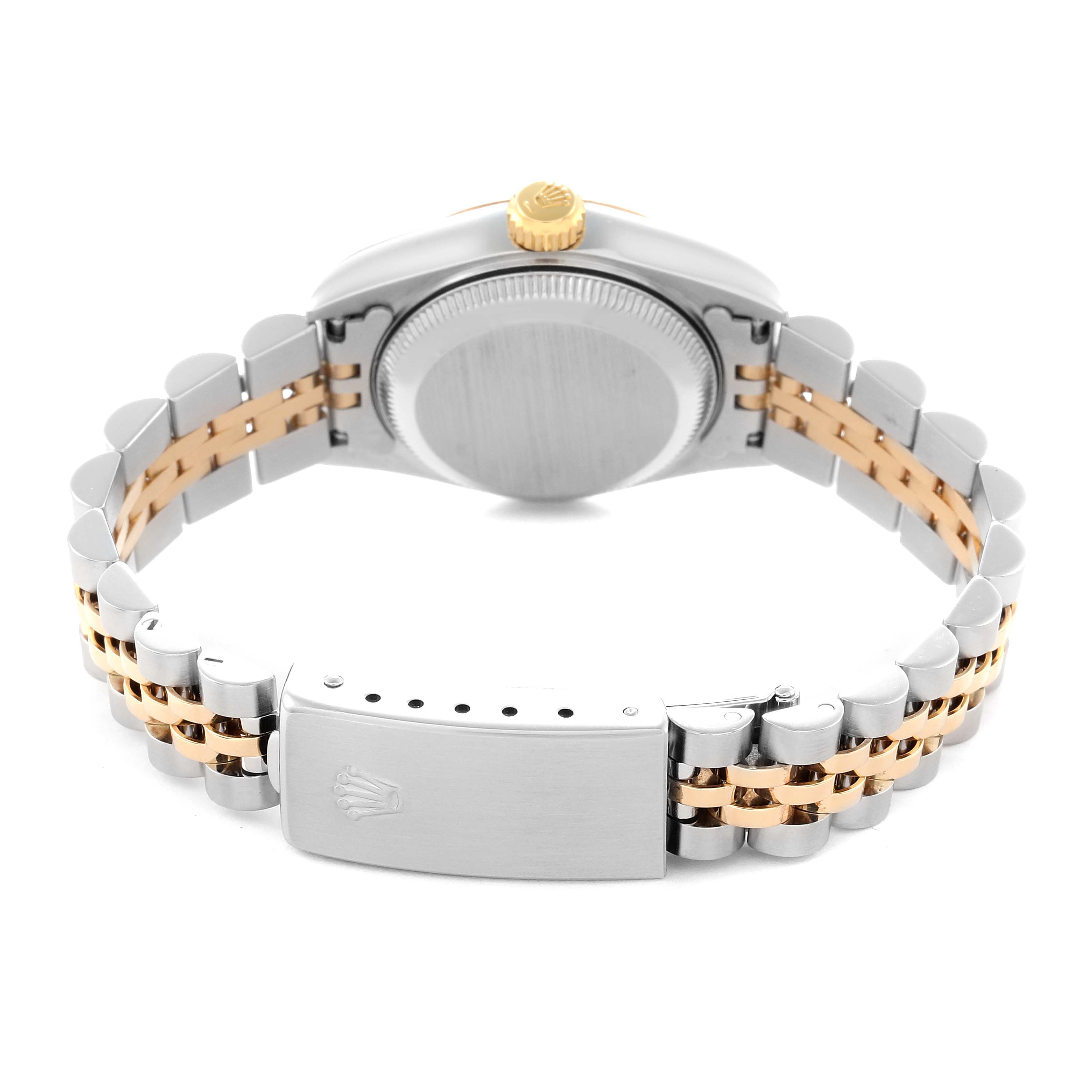 The image shows the back view of a Rolex Datejust model 79173 men
s watch, highlighting the case, crown, and bi-metal bracelet with clasp.