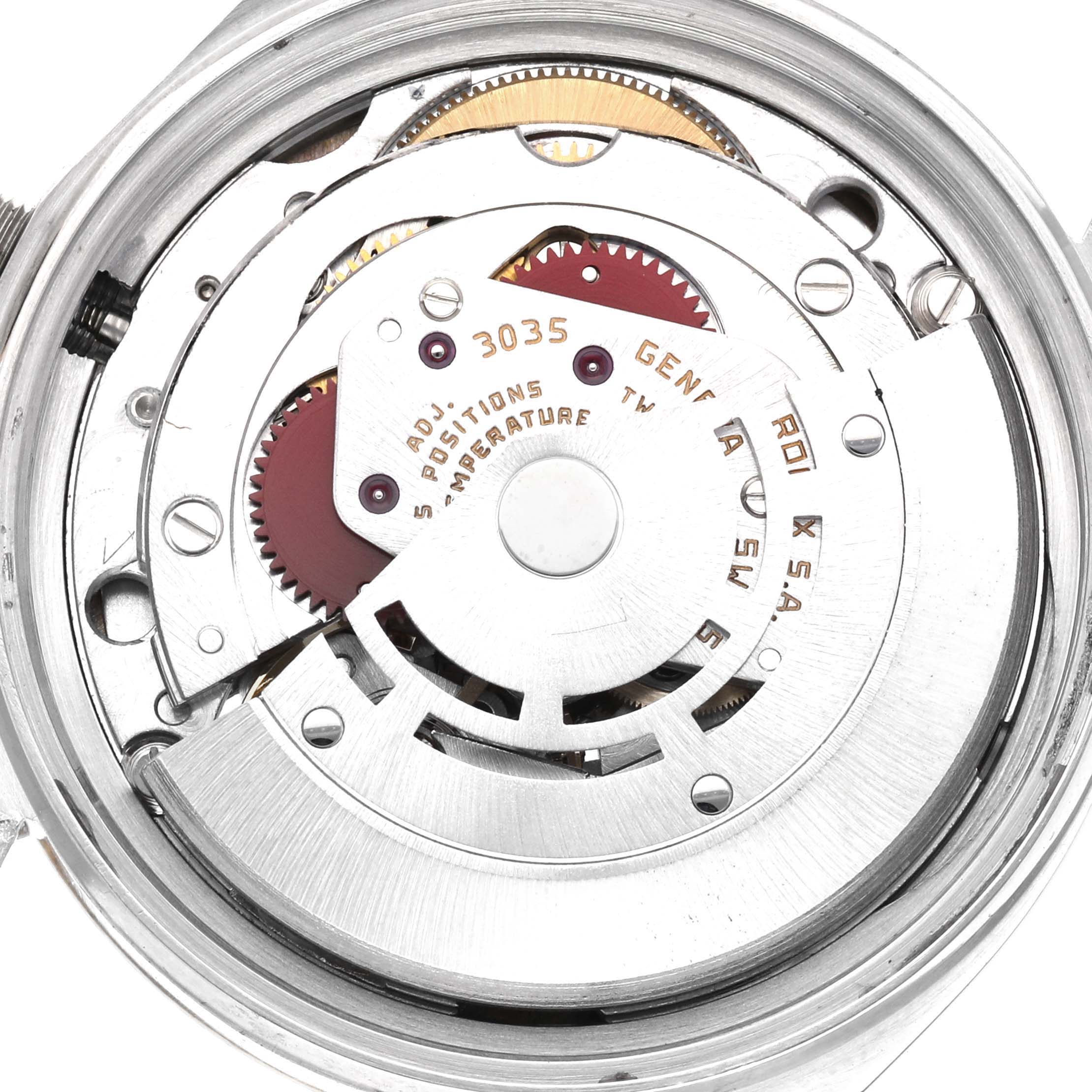 The image shows the movement mechanism of the Rolex Vintage Collection model 16013, highlighting gears and components from a rear angle.