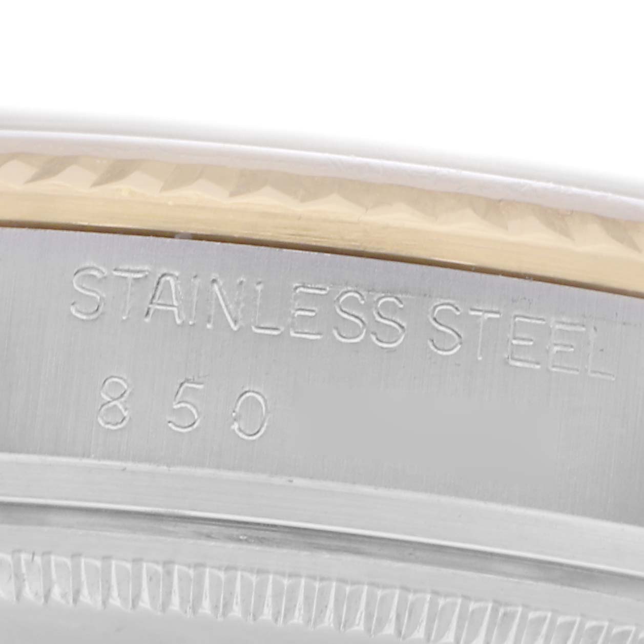 The image shows a close-up of the outer rim of a Rolex Vintage Collection model, model number 16013, displaying "STAINLESS STEEL 850."
