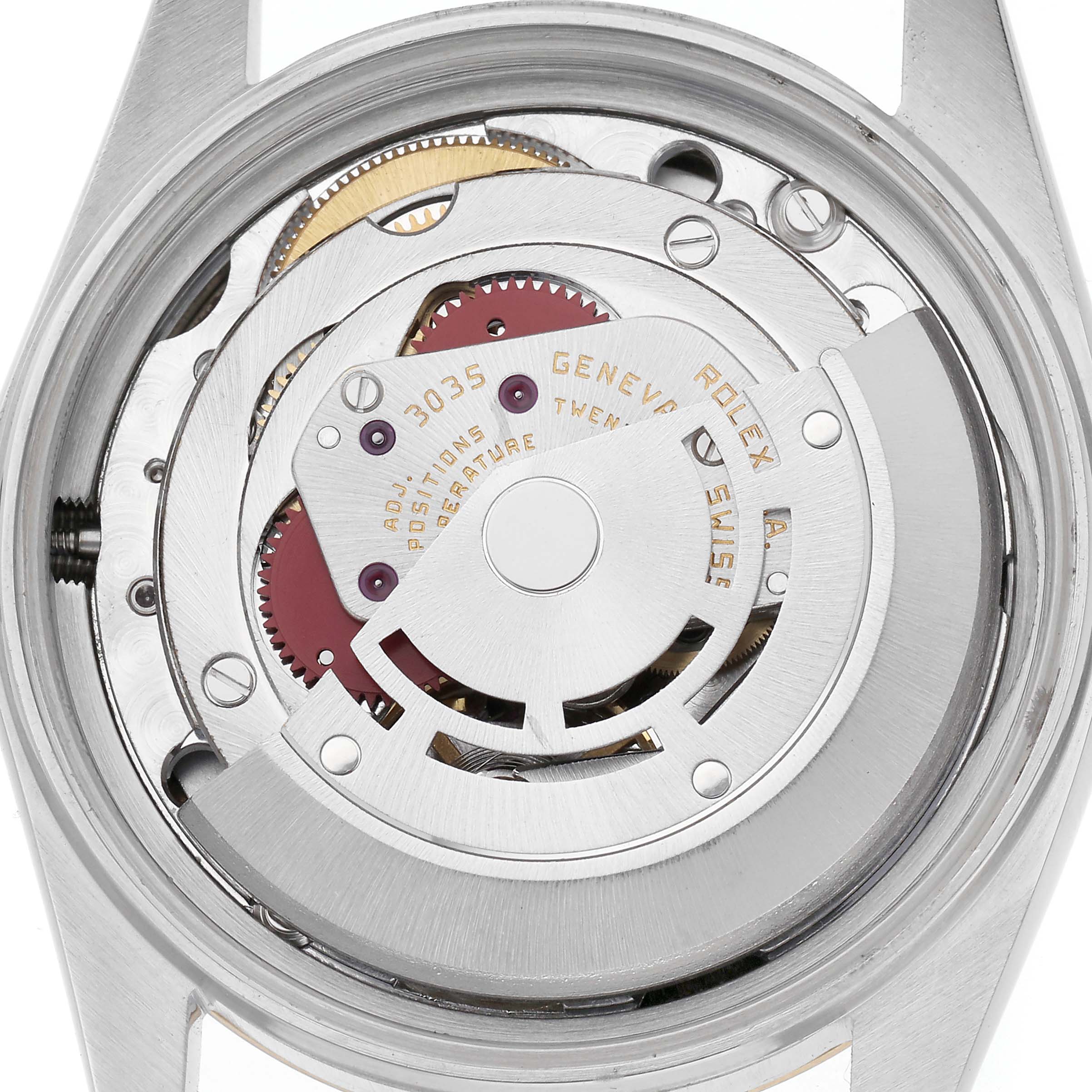 The image shows the back view of a Rolex Vintage Collection model 16013, focusing on the exposed mechanical movement parts.