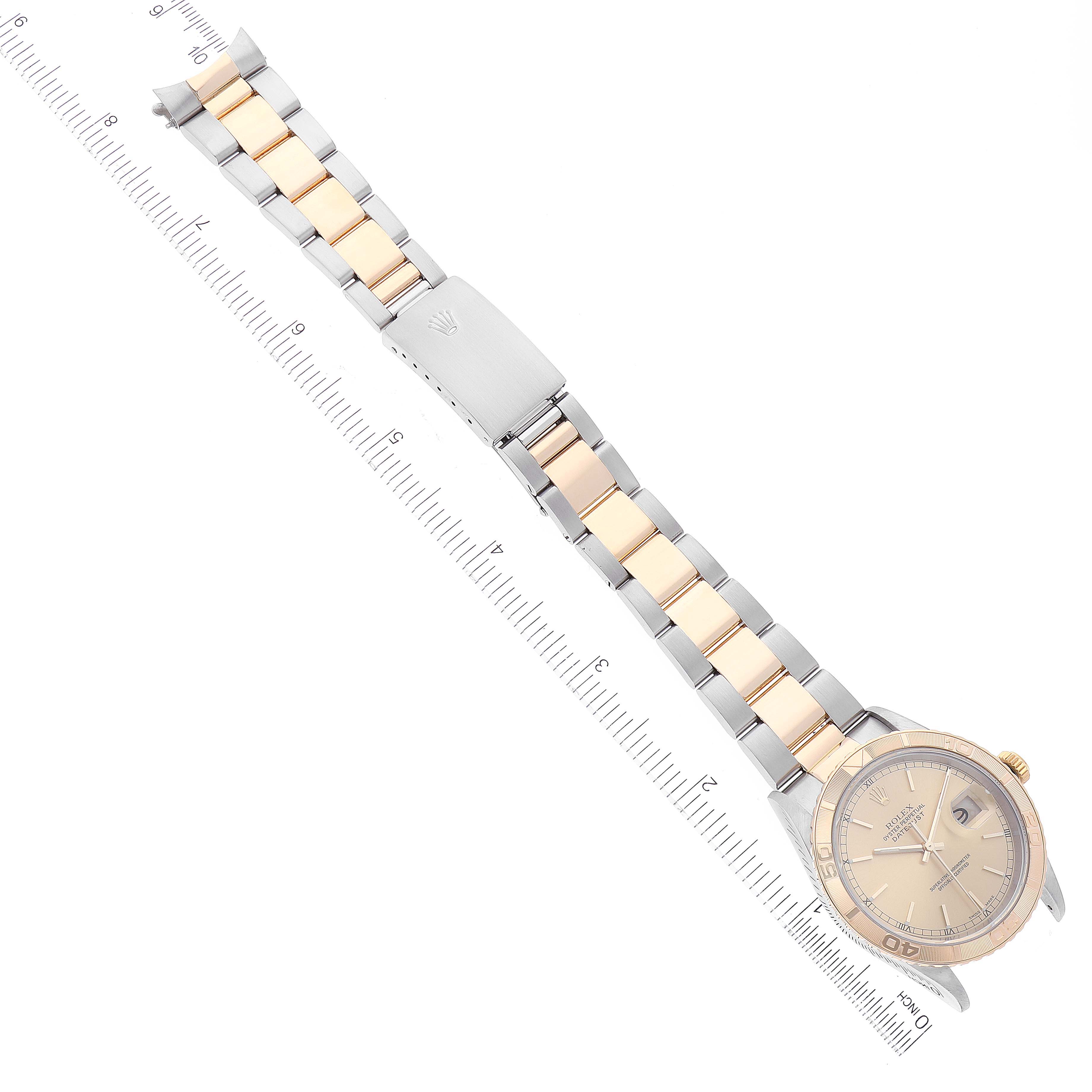 The image shows an angled top view of a Rolex Turn-o-Graph 16263 Men
s Steel and Gold (two tone) Champagne Dial 16263 Men
s Steel and Gold (two tone) Champagne Dial watch, featuring the dial, bezel, bracelet, and clasp.