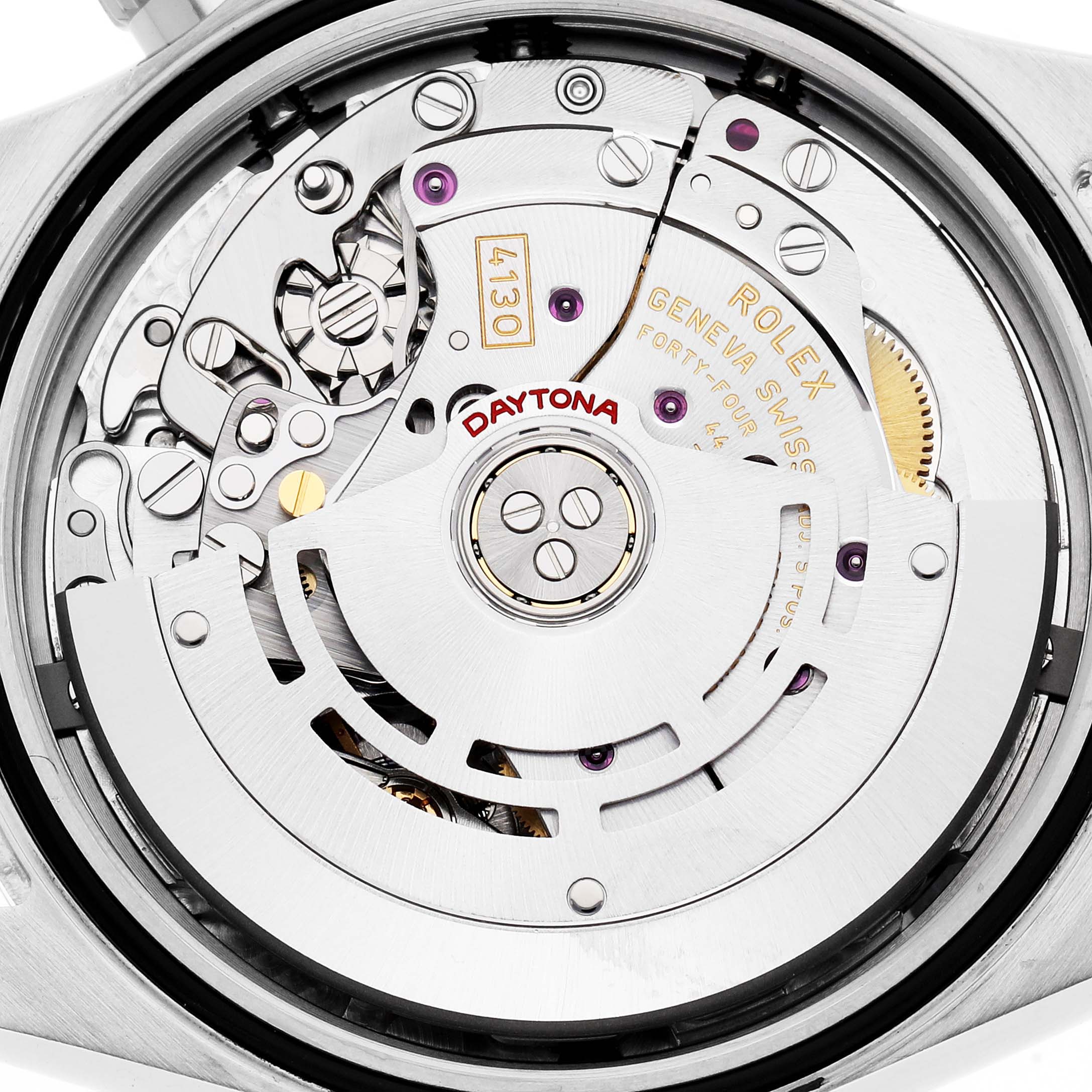 The image shows the movement mechanism of a Rolex Daytona model 116520 men's watch from the back view, highlighting its intricate components.