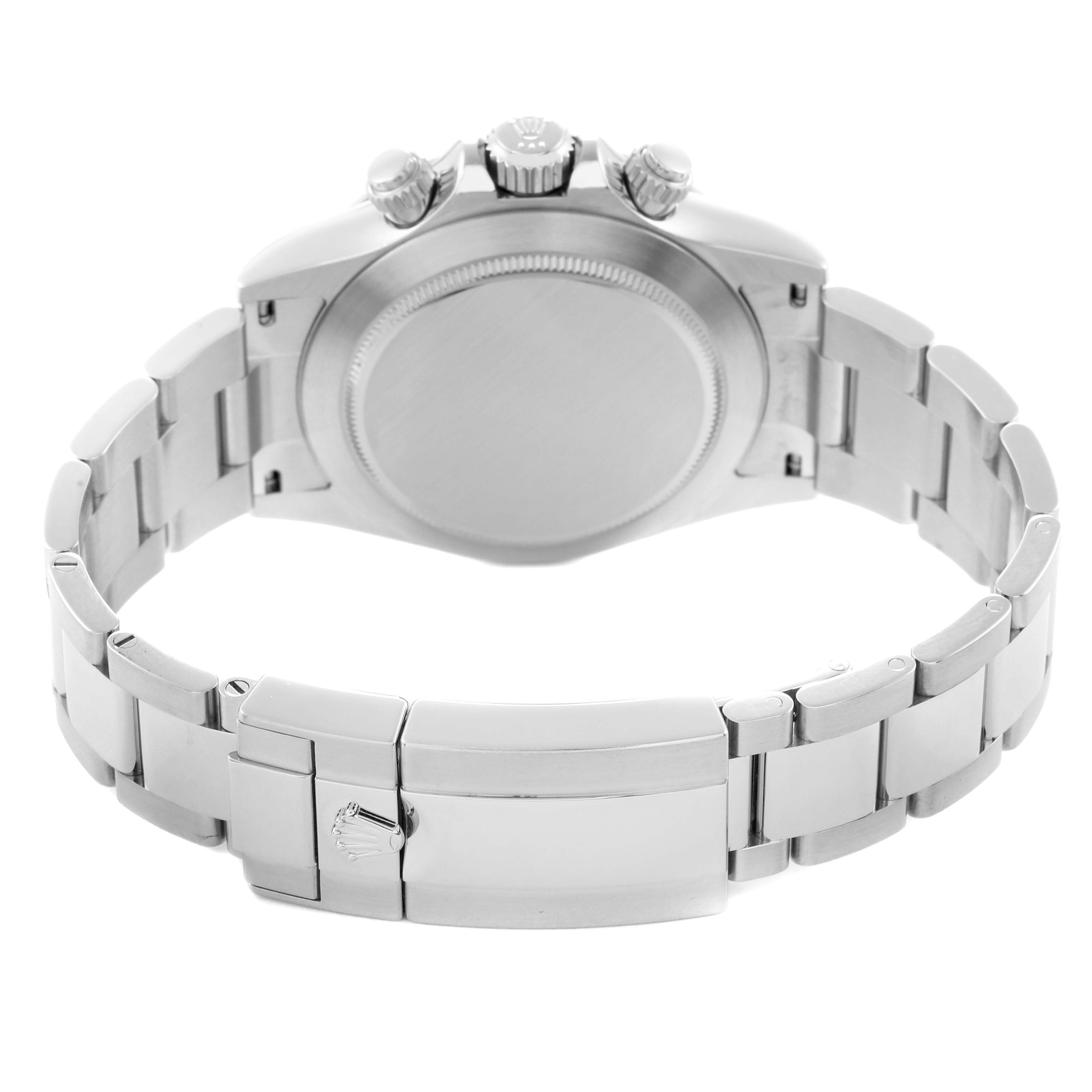 The image shows the rear view of a Rolex Daytona model 116520, highlighting its bracelet, clasp, and caseback.