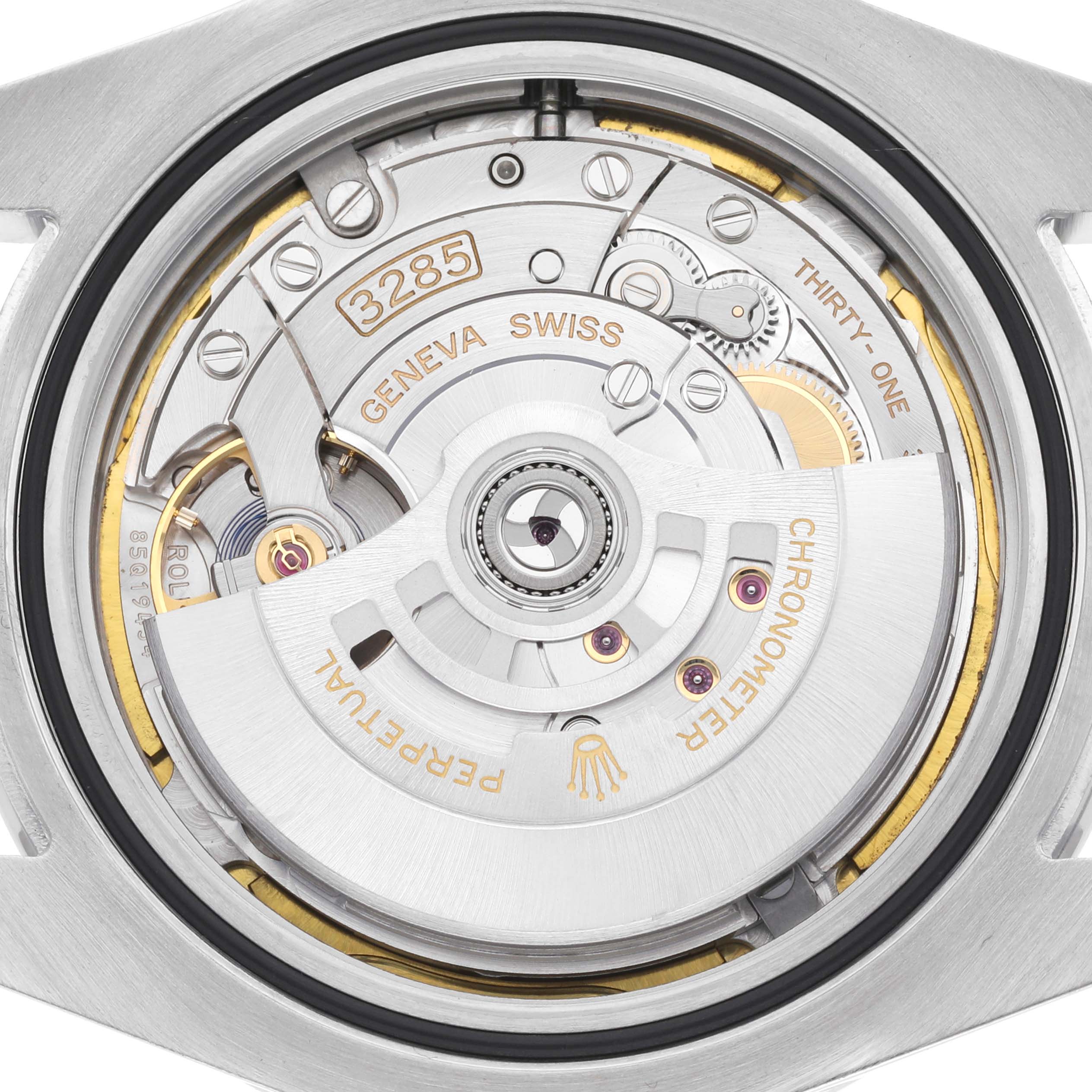 The image shows the movement of the Rolex Explorer model 226570, highlighting its intricate gears and mechanisms from a top-down angle.