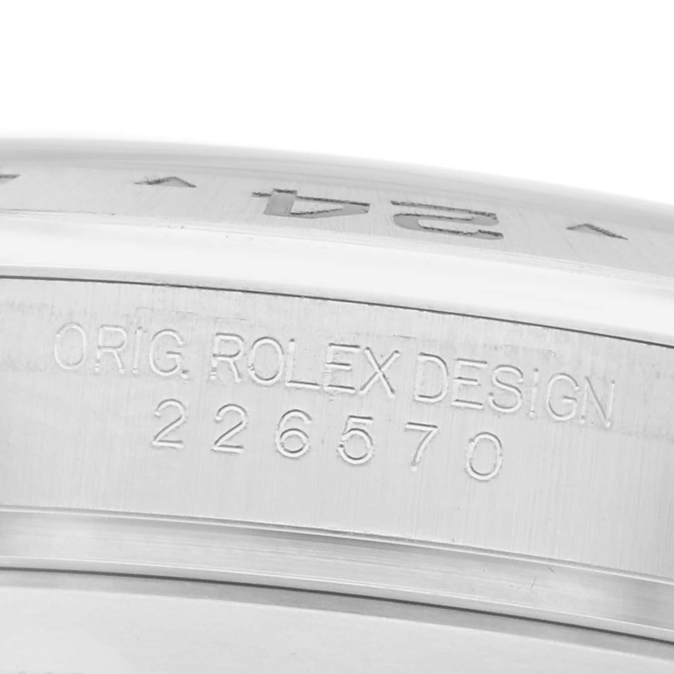 The image shows a close-up of the side engraving on a Rolex Explorer, model number 226570, highlighting "ORIG. ROLEX DESIGN" and the model number.