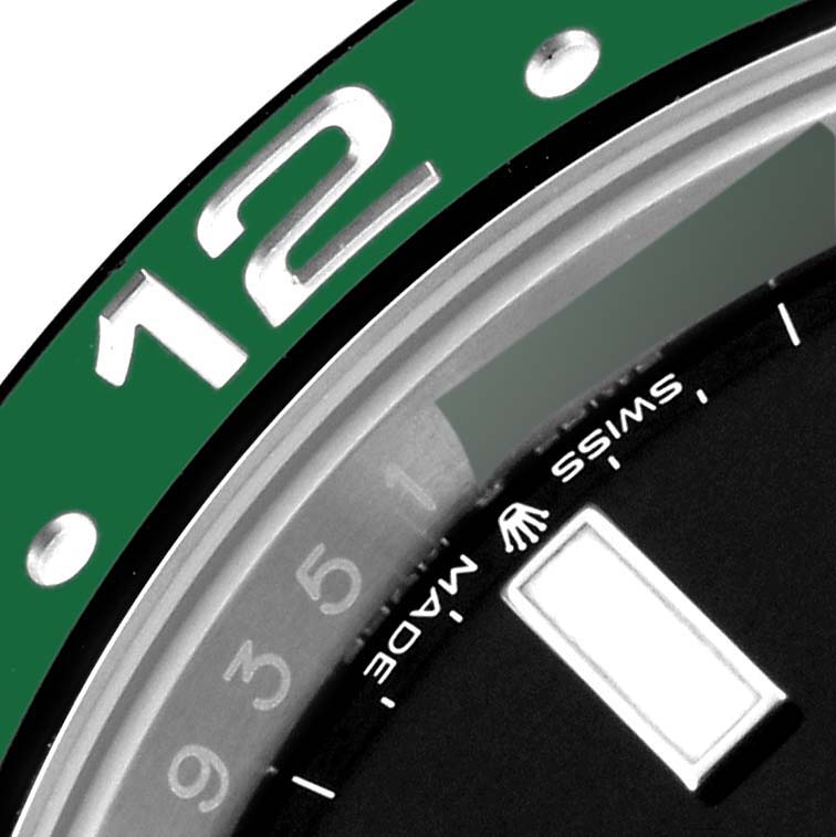 This close-up image of the Rolex GMT-Master 126720 Men's Stainless Steel Black Dial 126720 Men's Stainless Steel Black Dial watch shows part of the bezel, dial, and "Swiss Made" text.