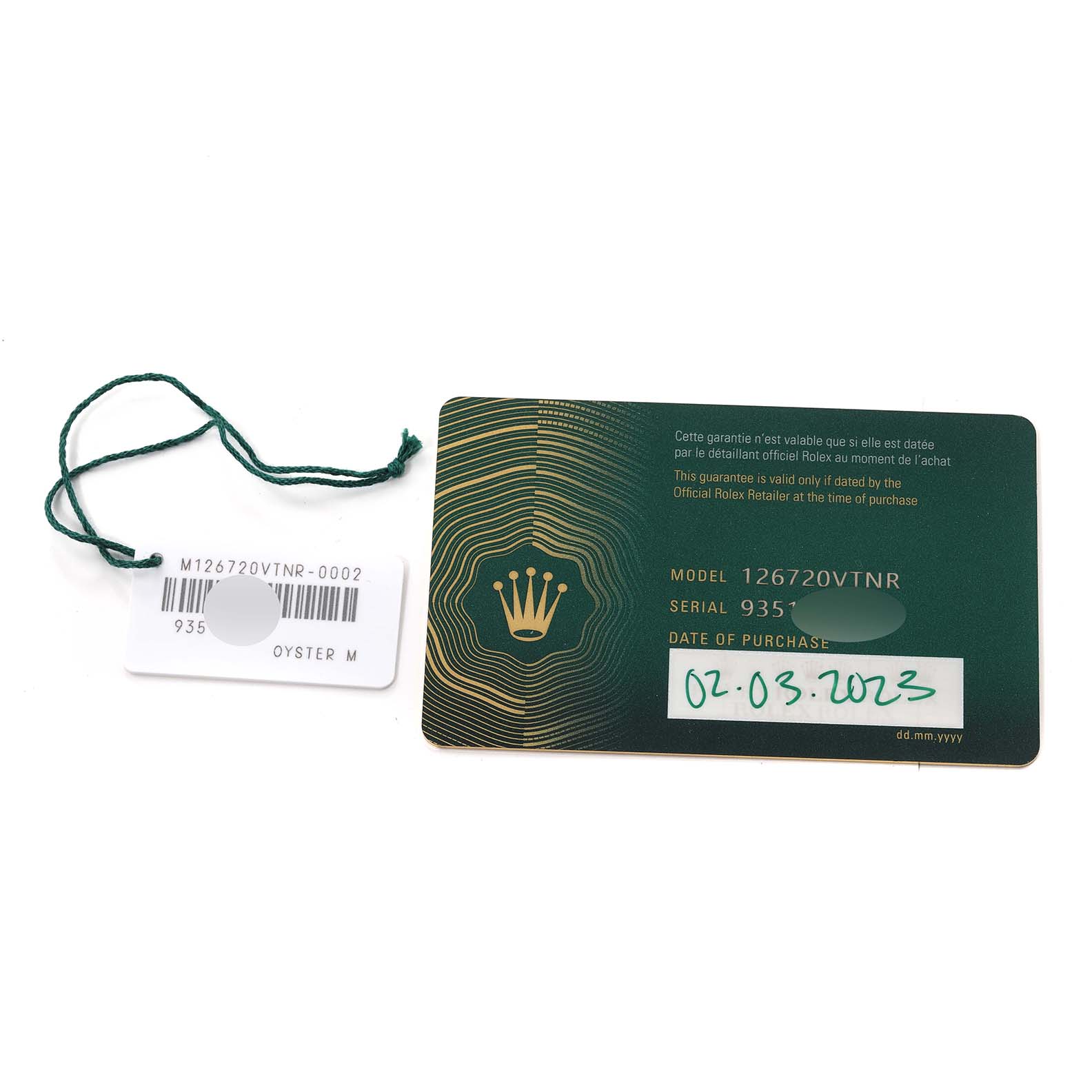 The image shows the warranty card and tag for a Rolex GMT-Master 126720 Men's Stainless Steel Black Dial 126720 Men's Stainless Steel Black Dial model 126720VTNR.