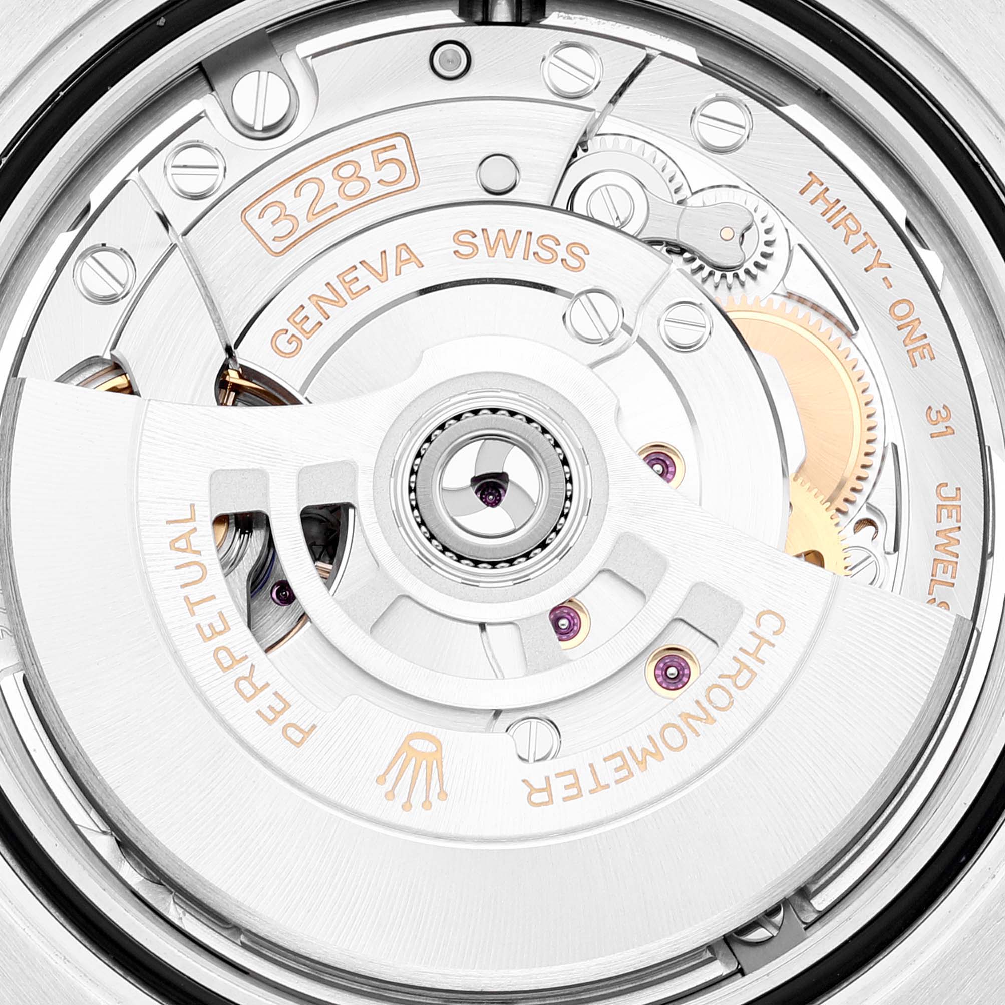 The image shows the intricate movement and components of the Rolex GMT-Master 126720 Men's Stainless Steel Black Dial 126720 Men's Stainless Steel Black Dial's Caliber 3285 from a close-up angle.