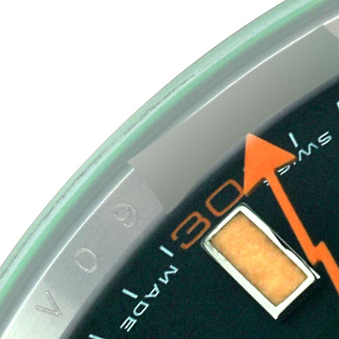 The image shows a close-up of the dial and hands of the Rolex Milgauss 116400 Men's Stainless Steel Black Dial 116400 Men's Stainless Steel Black Dial watch, focusing on the "30" minute mark and the edge of the watch face.