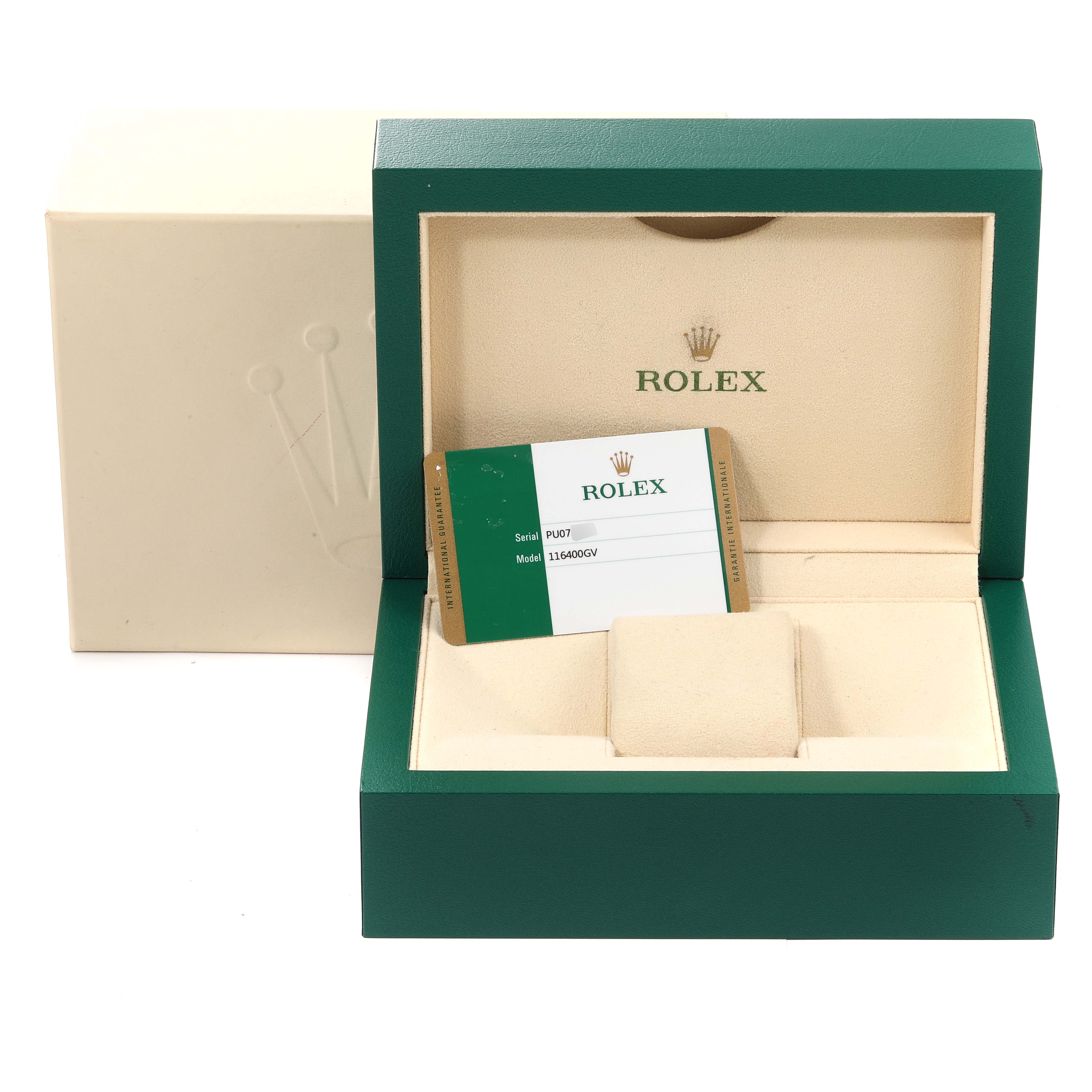The image shows an open green Rolex box with the Milgauss model card visible inside.