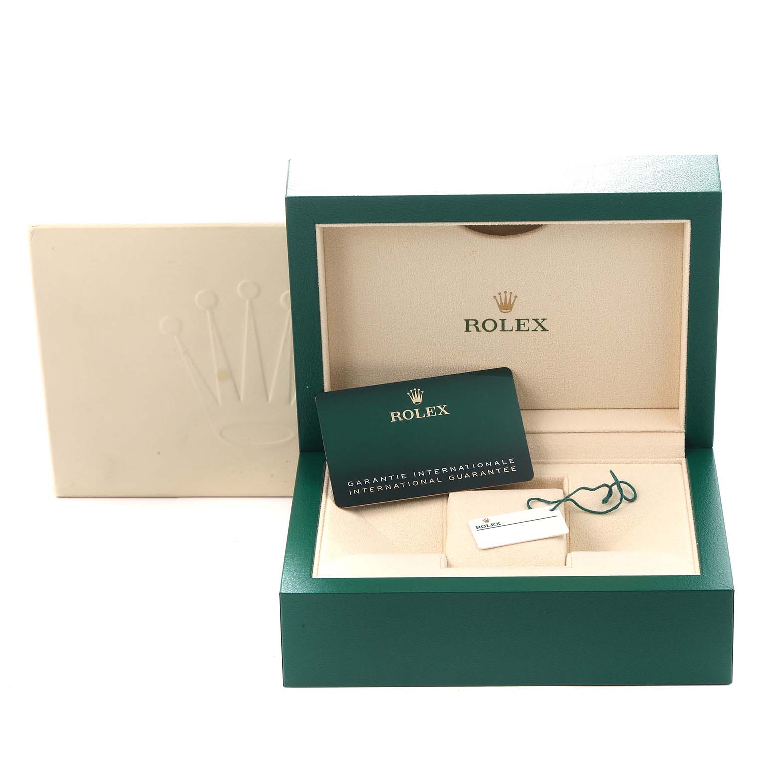 The image shows the packaging and accessories for a Rolex Oyster Perpetual model 124300 men's watch, including the box, guarantee card, and tag.