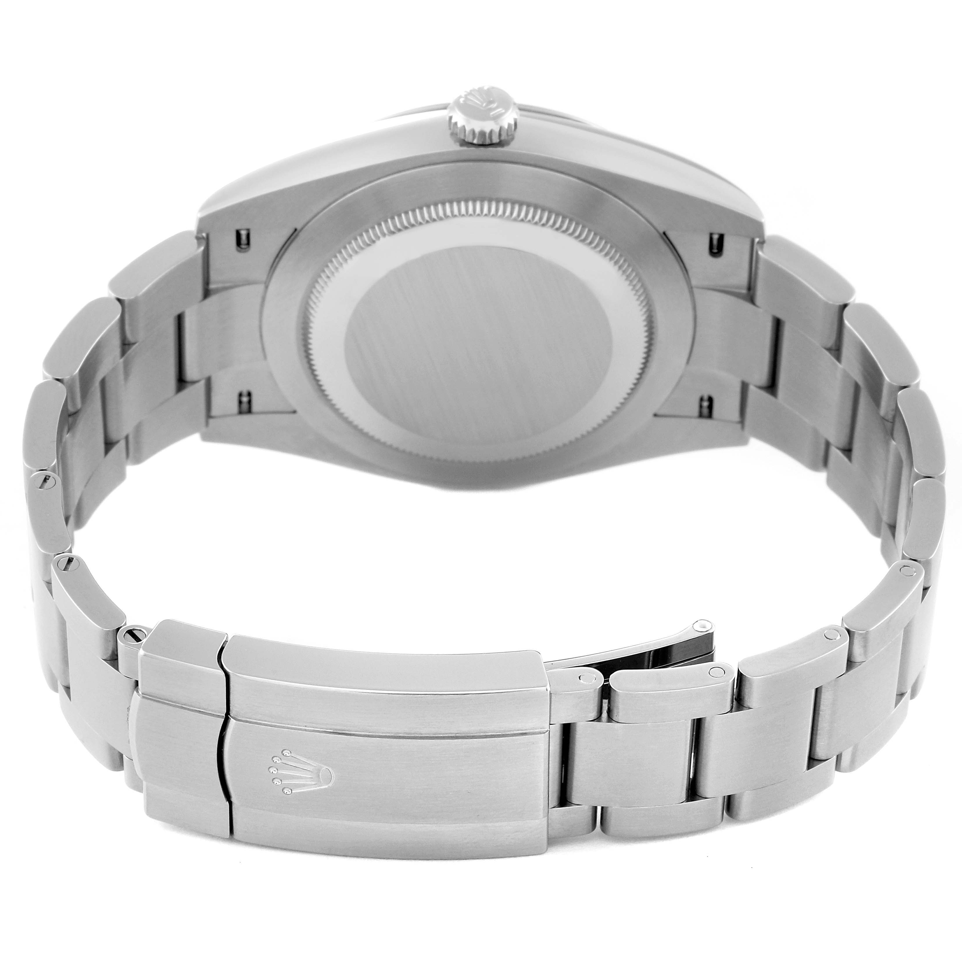 This image shows the back view of a Rolex Oyster Perpetual 124300 Men's Stainless Steel Silver Dial 124300 Men's Stainless Steel Silver Dial watch, highlighting its clasp, case, and a portion of the bracelet.