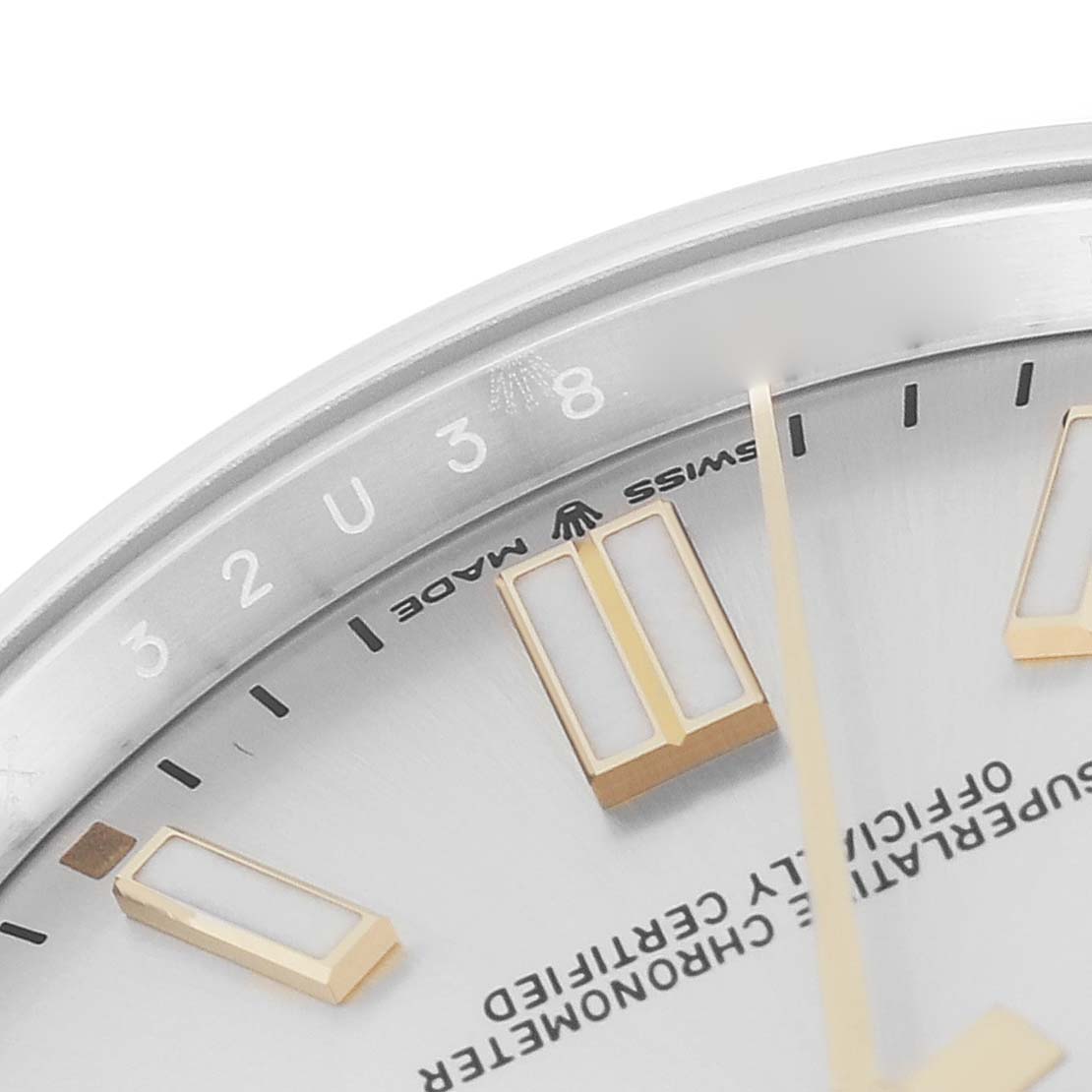 The image shows a close-up of the top-right section of the dial and bezel of a Rolex Oyster Perpetual 124300 Men's Stainless Steel Silver Dial 124300 Men's Stainless Steel Silver Dial watch.