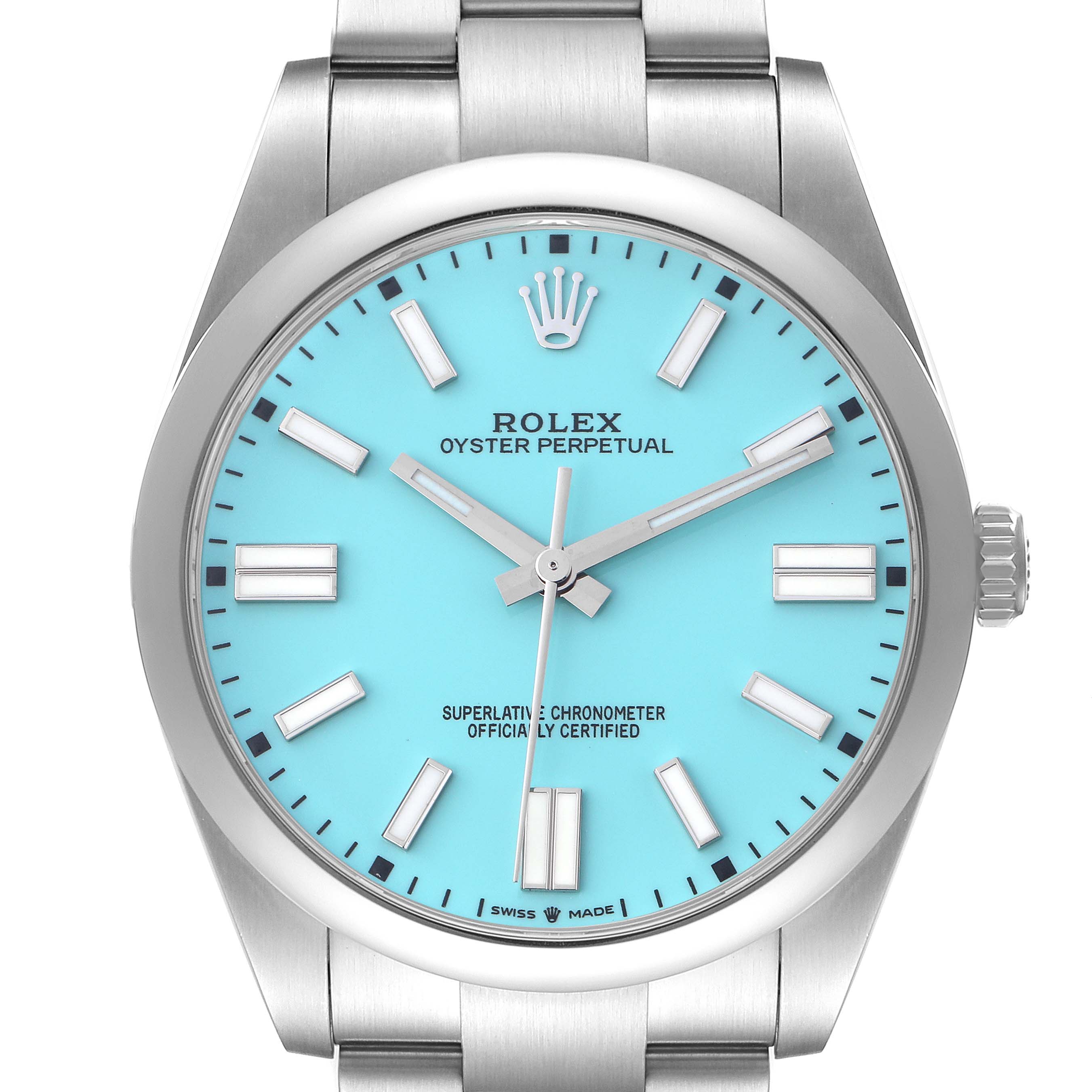 The Rolex Oyster Perpetual model 124300 is shown from the front, displaying its turquoise dial, hour markers, hands, and part of the stainless steel bracelet.