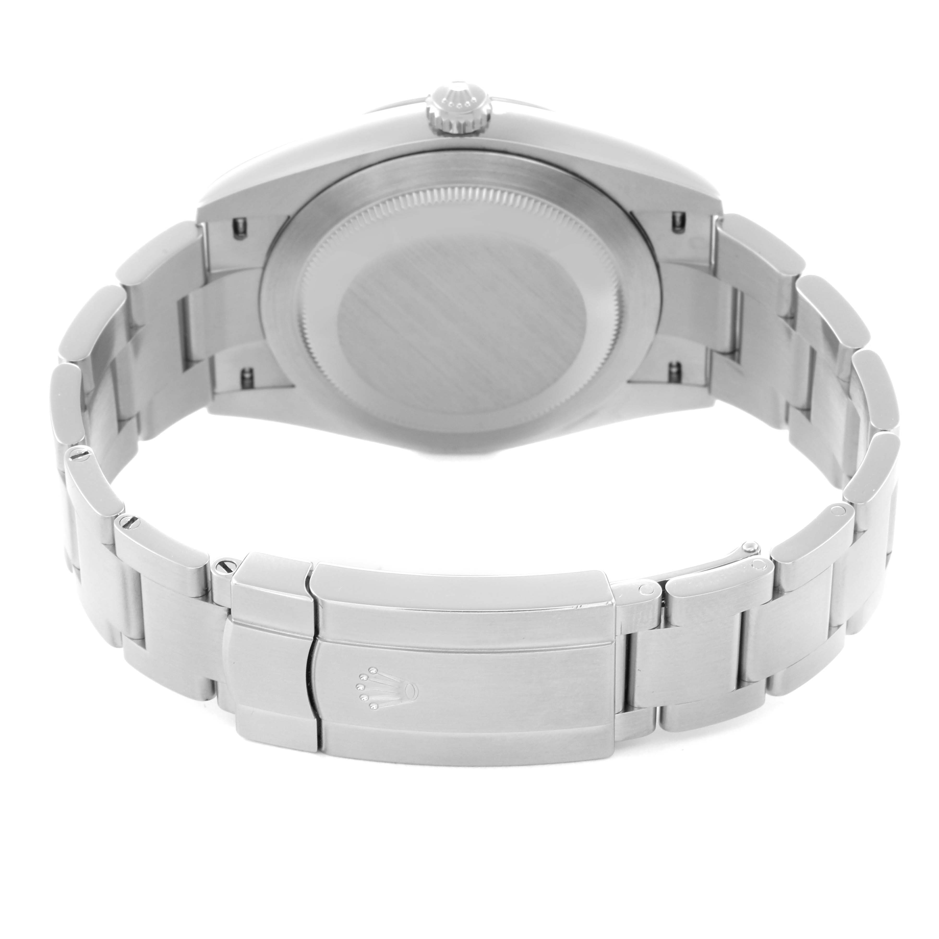 The image shows the back view of the Rolex Oyster Perpetual model 124300 men's watch, highlighting the case back, bracelet, and clasp.