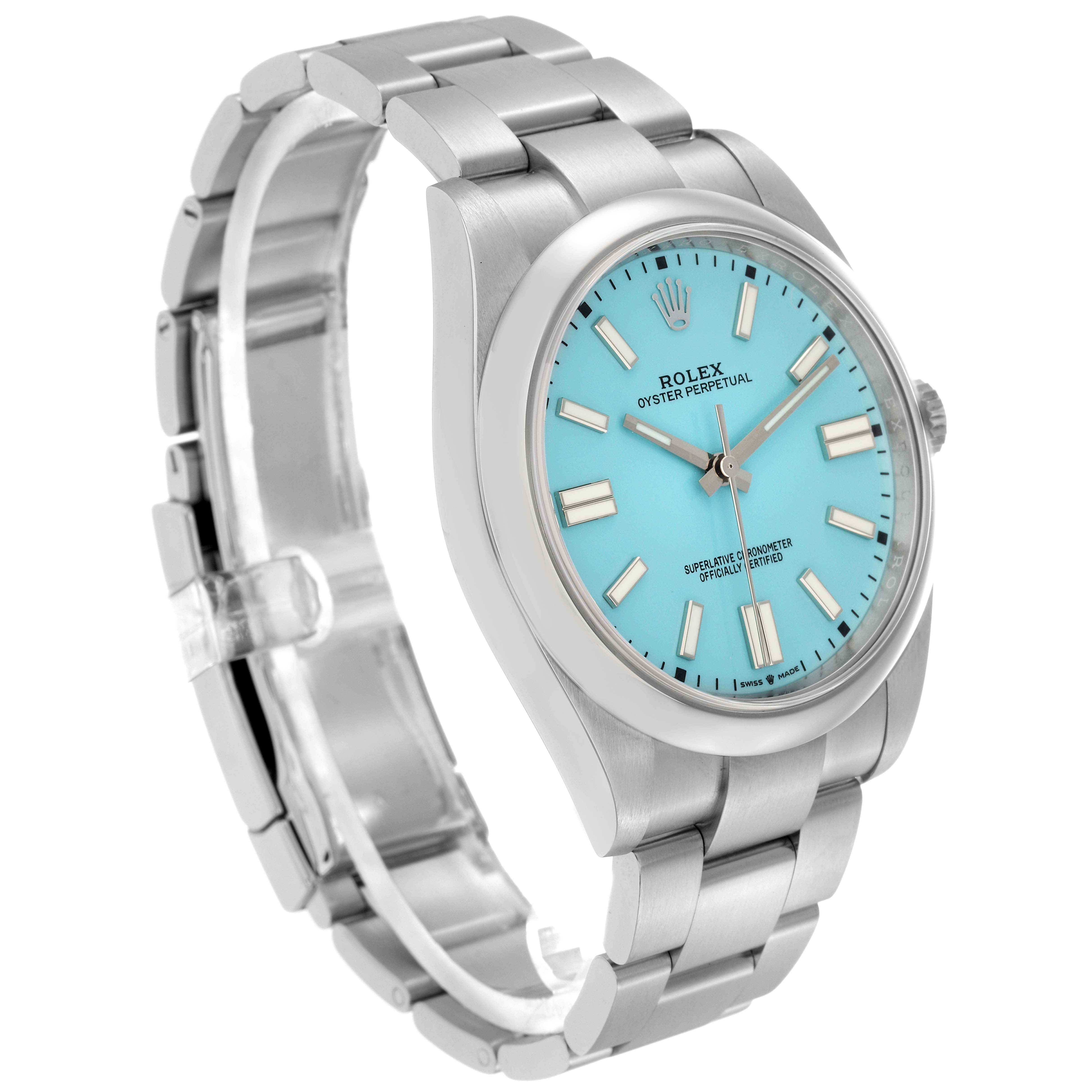 The image shows a side angle of the Rolex Oyster Perpetual model 124300 men's watch, highlighting the turquoise dial, bezel, and part of the stainless steel bracelet.