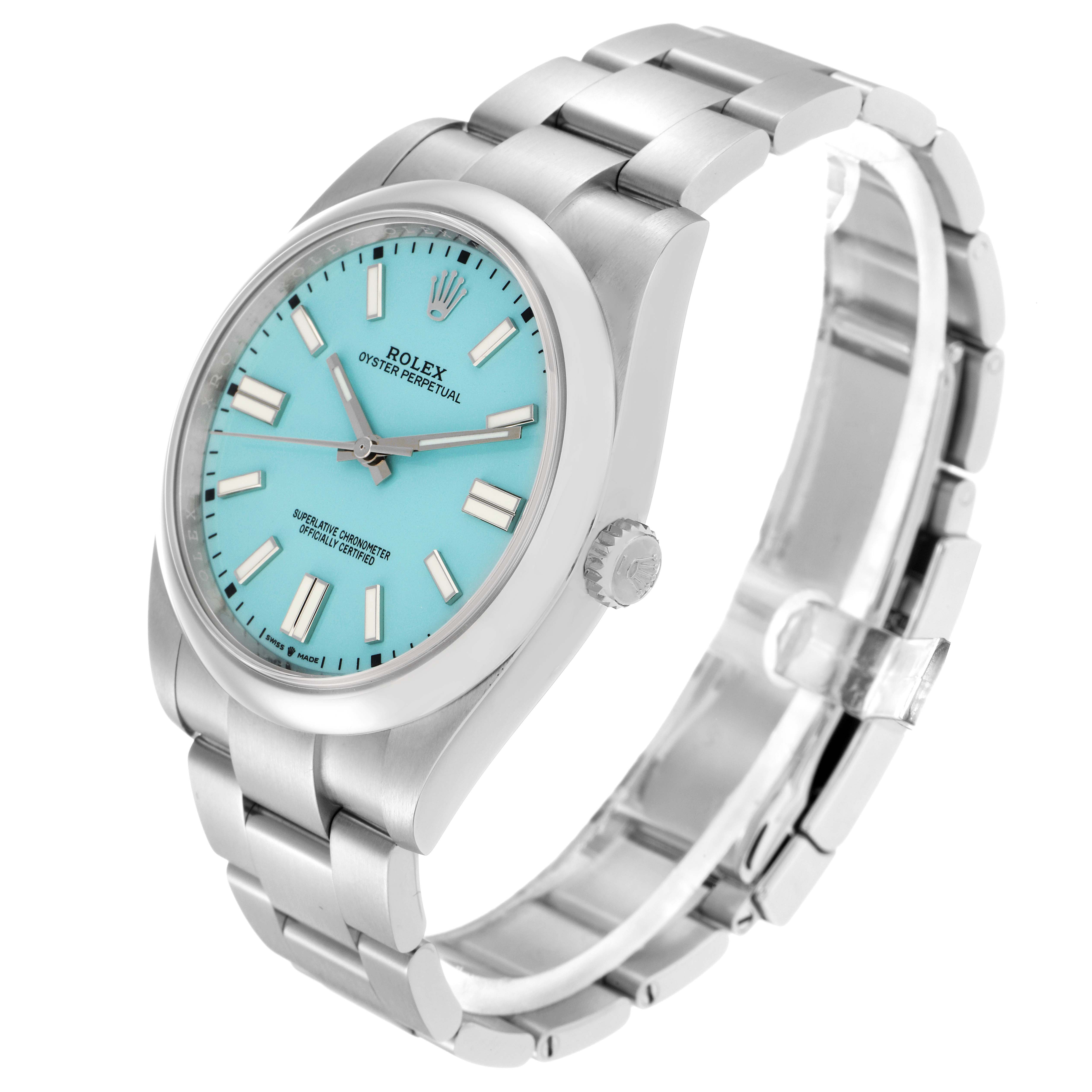 The Rolex Oyster Perpetual model 124300 is shown at a three-quarter angle, highlighting the face, crown, and part of the bracelet.