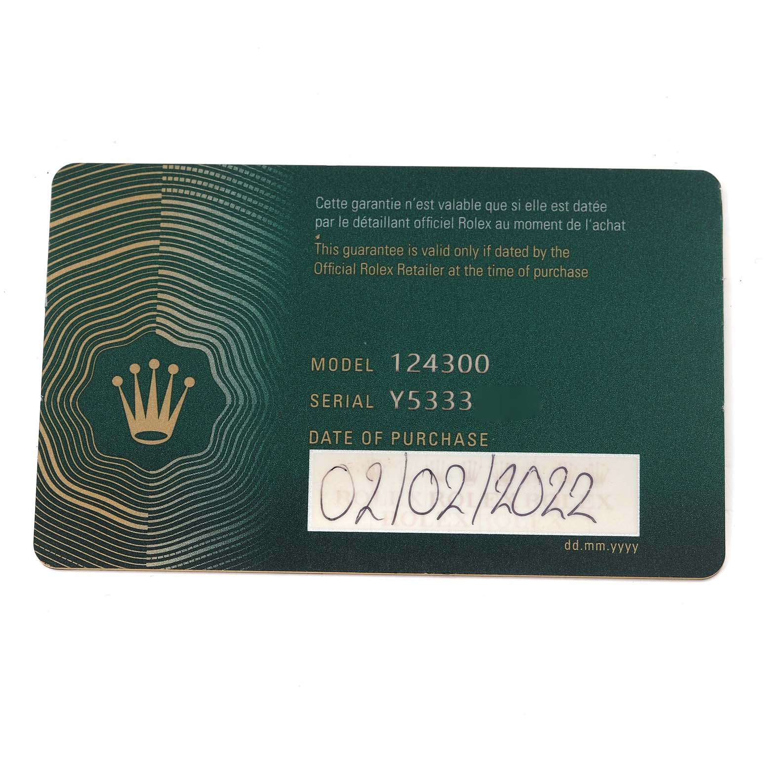 The image shows a warranty card for a Rolex Oyster Perpetual, model number 124300, indicating the date of purchase and serial number.