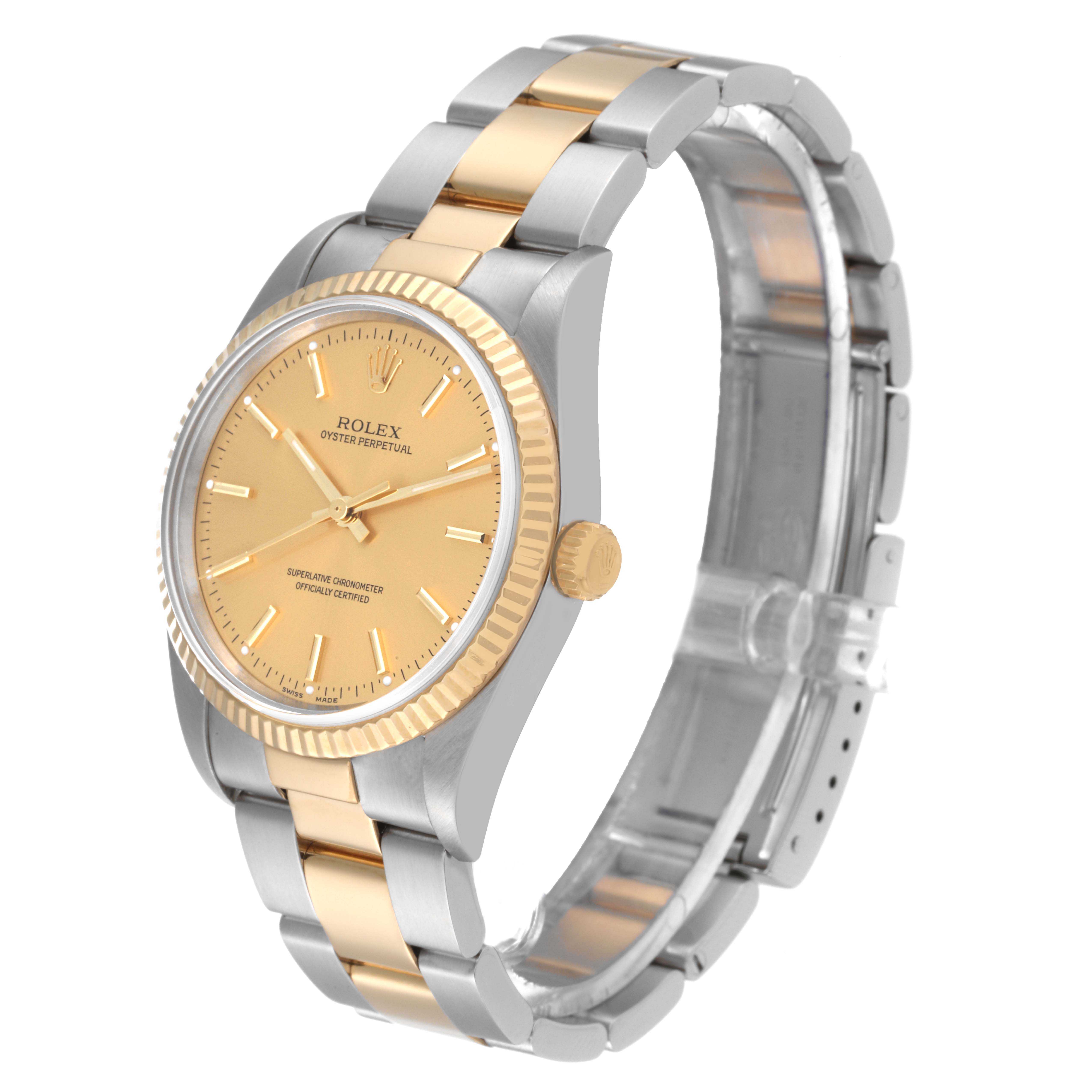 The image shows a Rolex Oyster Perpetual 14233 Men's Steel and Gold (two tone) Champagne Dial 14233 Men's Steel and Gold (two tone) Champagne Dial watch from a side angle, displaying the face, bezel, crown, and bracelet.