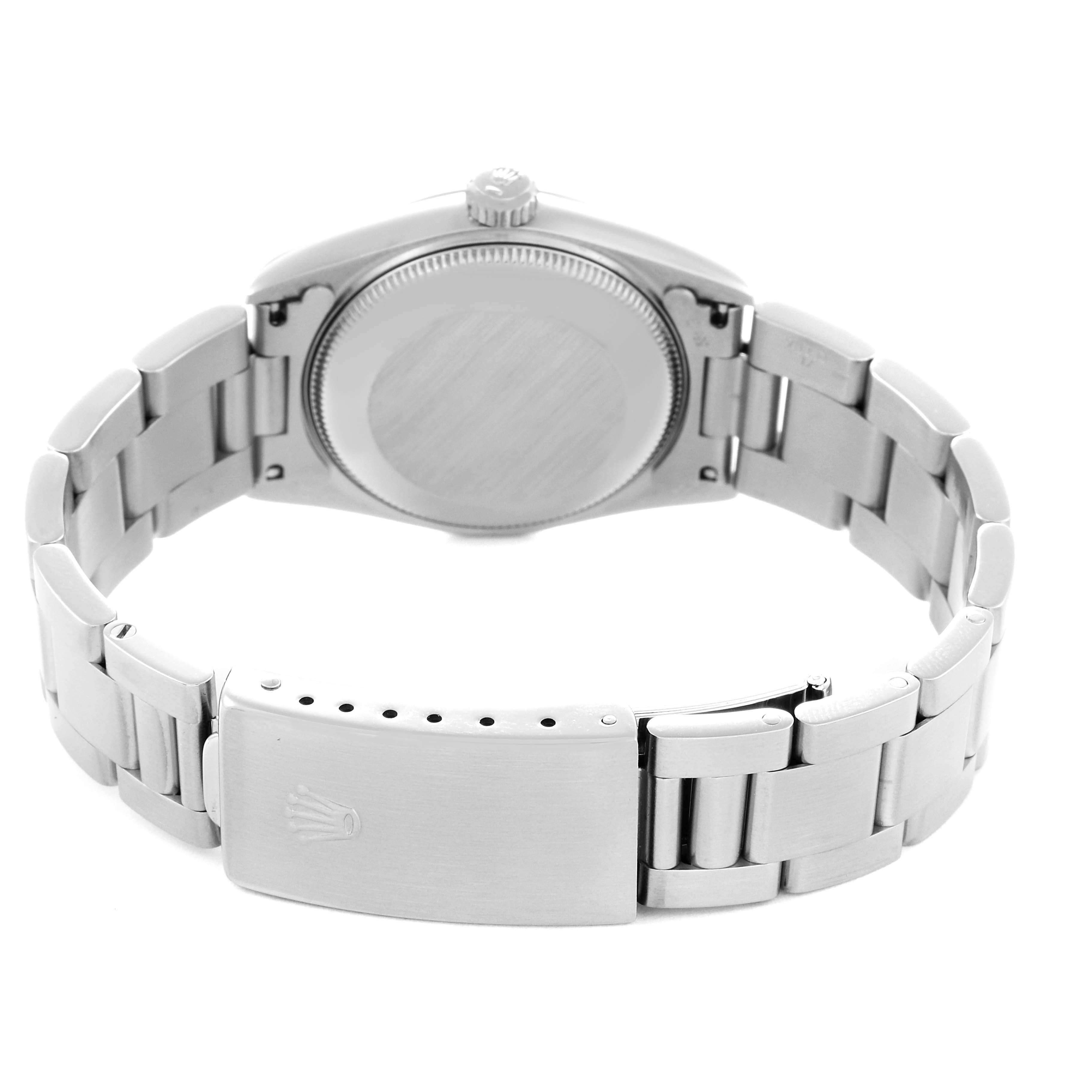 The image shows the back view of a Rolex Oyster Perpetual men's watch model 67480, highlighting the case back, bracelet, and clasp with the Rolex logo.