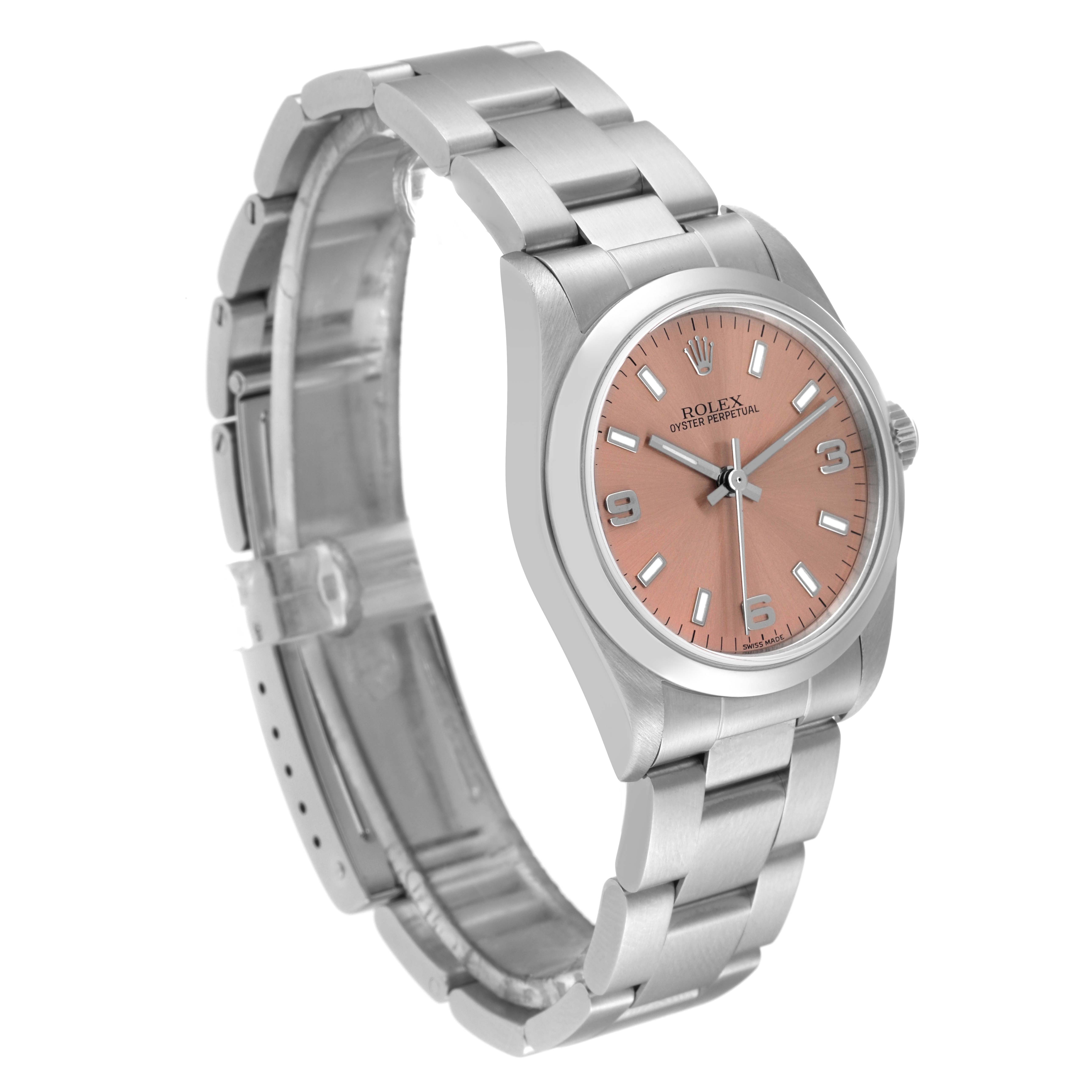 This image shows a Rolex Mid-Size 77080 Women's Stainless Steel Pink Dial 77080 Women's Stainless Steel Pink Dial model watch from a three-quarter angle, highlighting its pink dial, case, and bracelet.