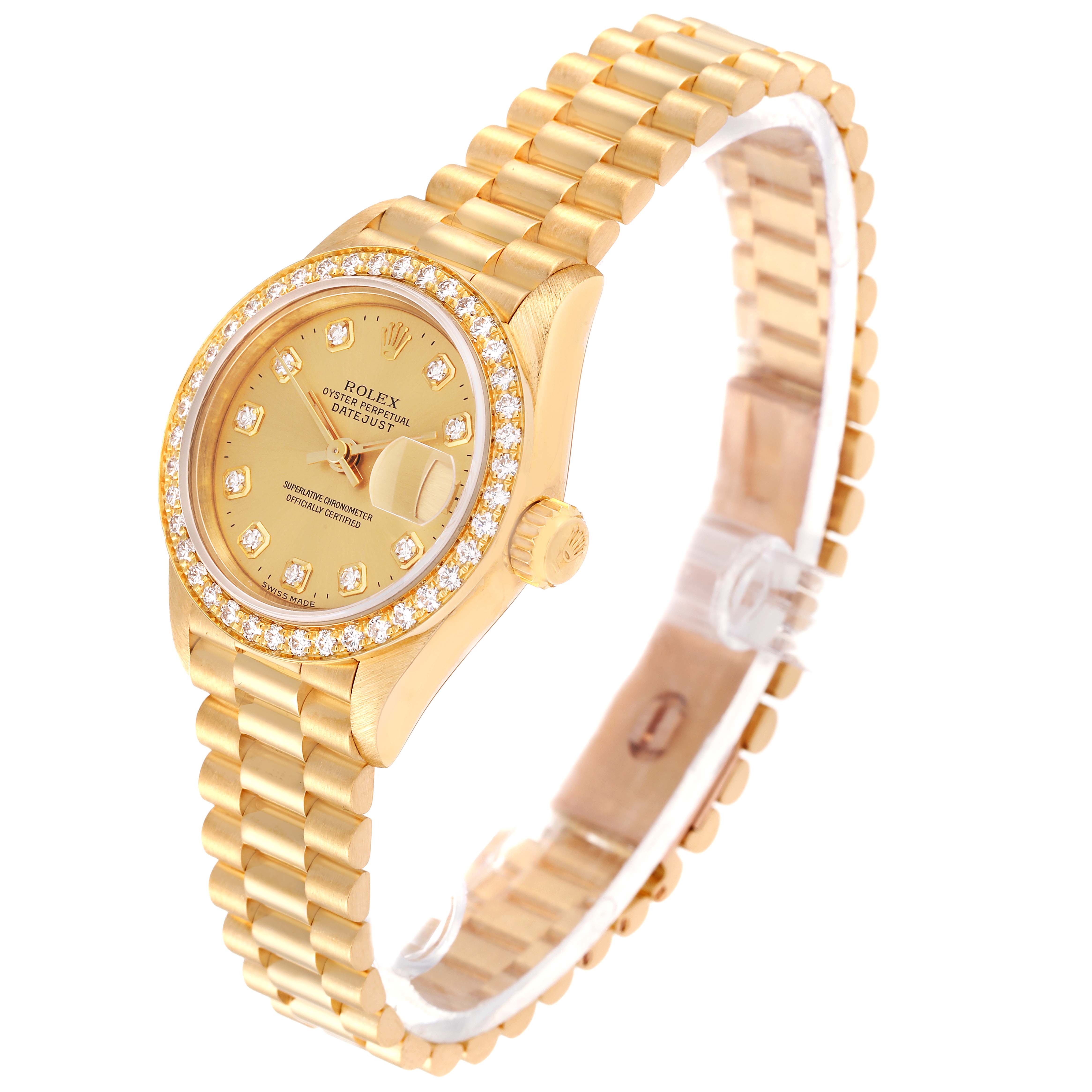 The Rolex President 69138 Women
s Yellow Gold Champagne Dial 69138 Women
s Yellow Gold Champagne Dial model watch is shown at an oblique angle, displaying its dial, diamond-studded bezel, crown, and bracelet.