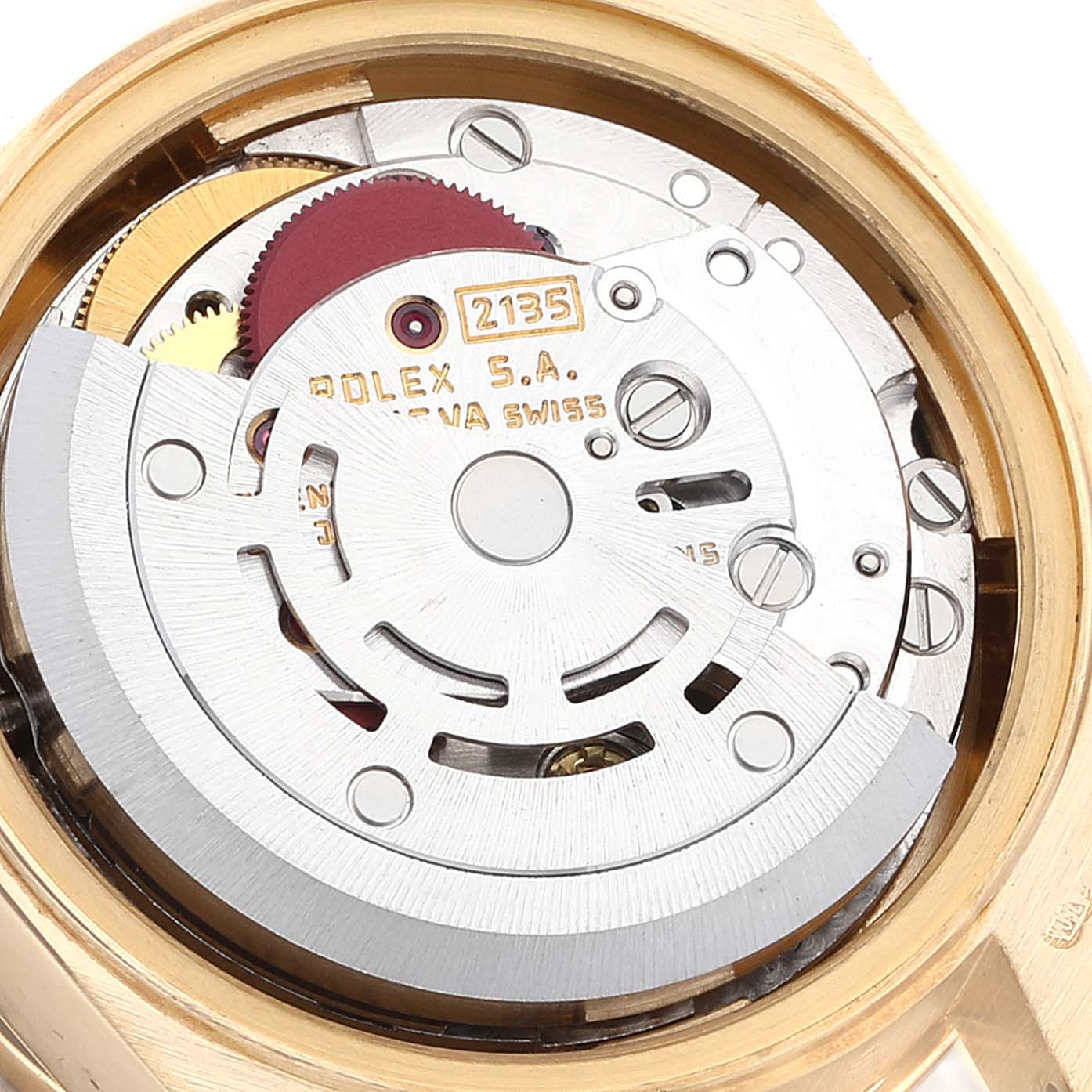 The image shows the movement of a Rolex President 69158 Women
s Yellow Gold Champagne Dial 69158 Women
s Yellow Gold Champagne Dial model watch viewed from the back.