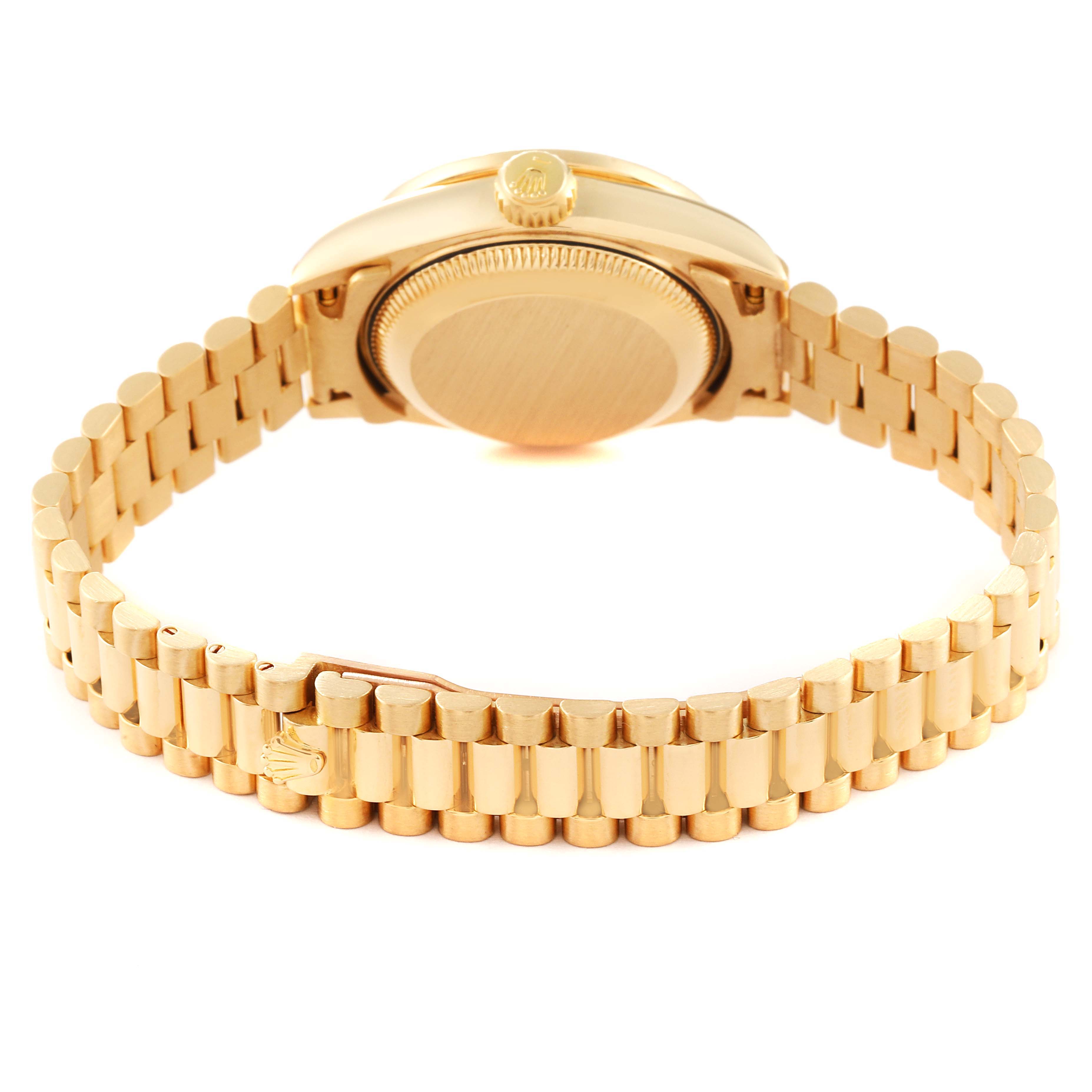 The image shows the case back and the President bracelet of a Rolex President 69158 Women
s Yellow Gold Champagne Dial 69158 Women
s Yellow Gold Champagne Dial model watch from a rear angle.