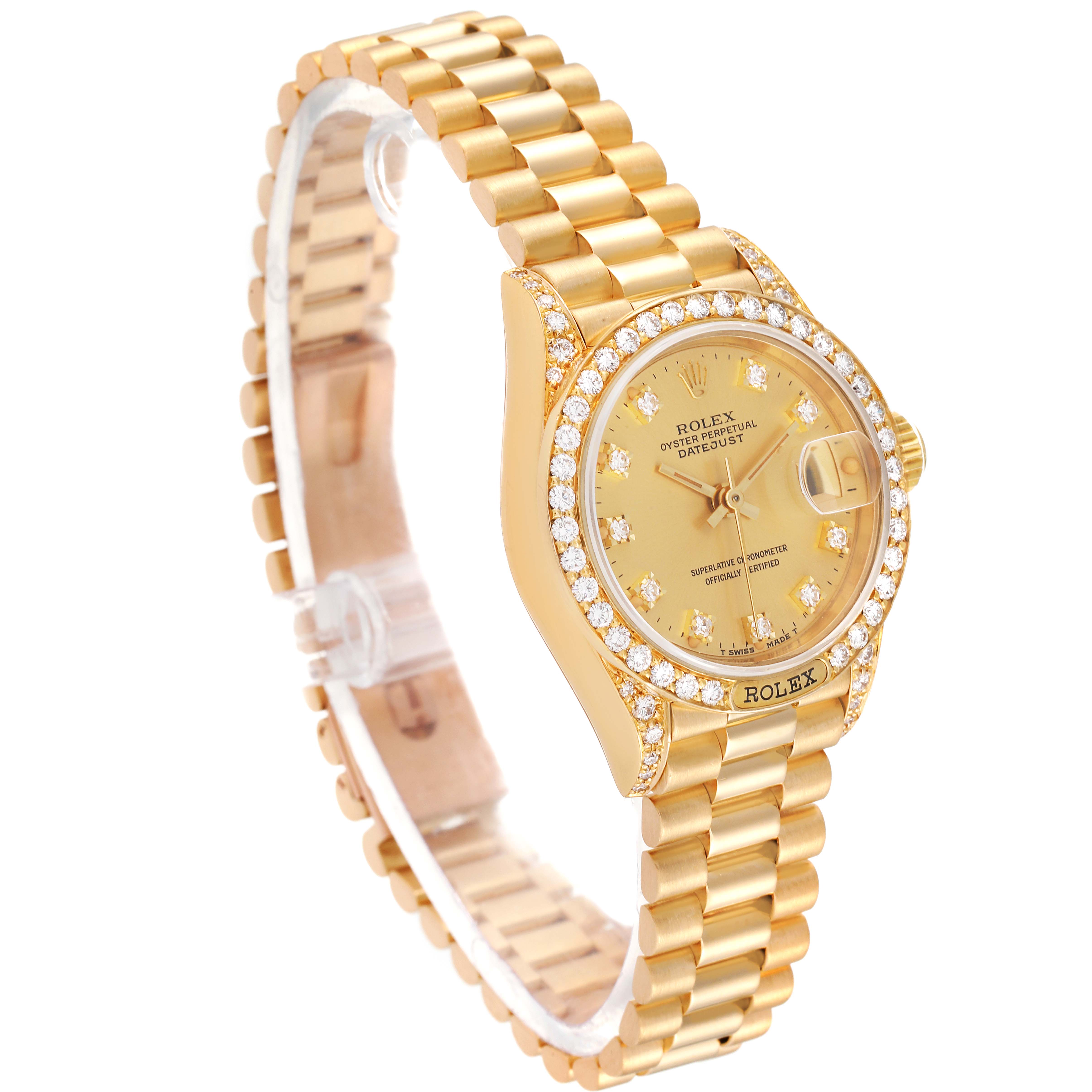 The Rolex President 69158 Women
s Yellow Gold Champagne Dial 69158 Women
s Yellow Gold Champagne Dial model watch is shown at an angle highlighting its gold, diamond-encrusted bezel, dial, and gold bracelet.