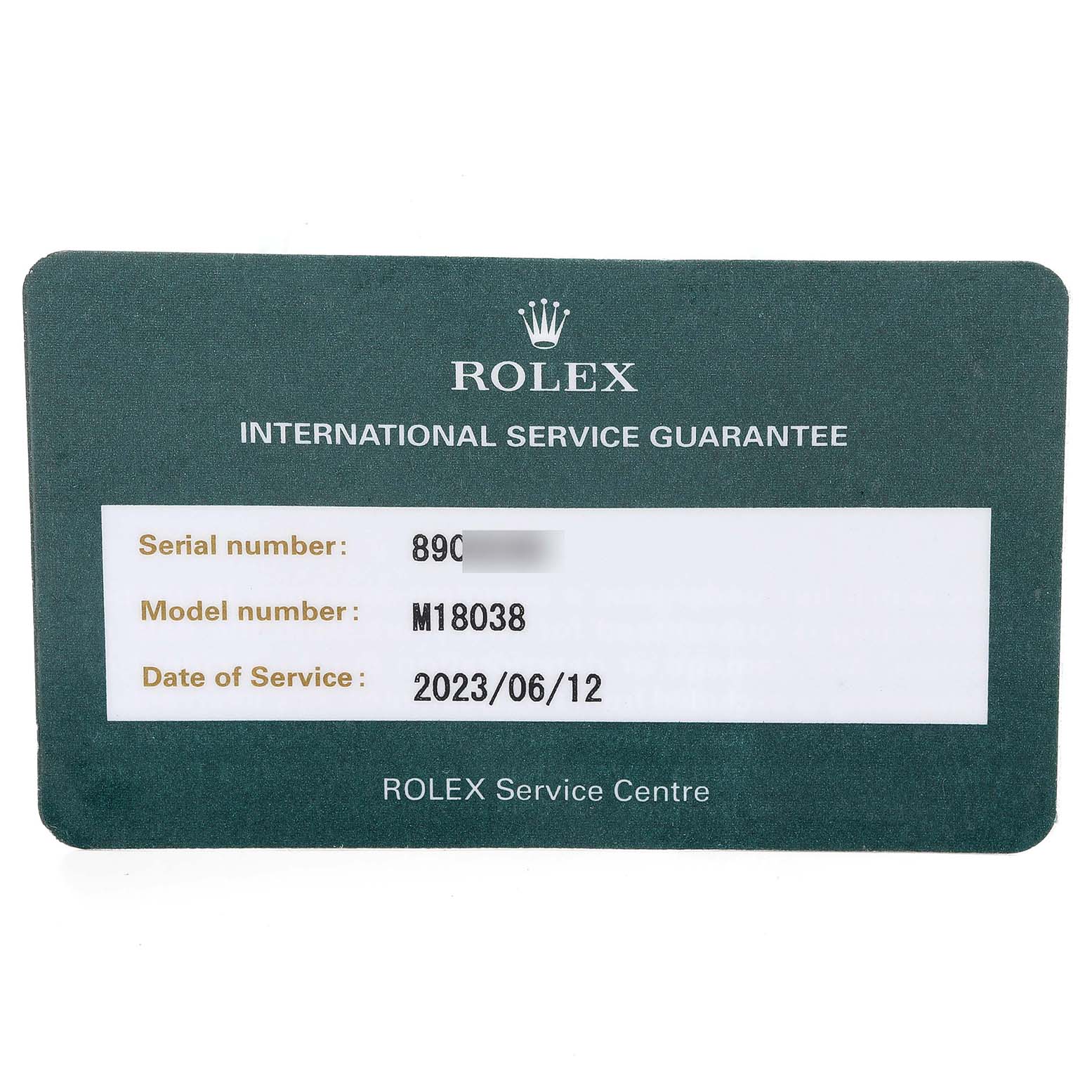 The image shows a Rolex international service guarantee card with details for the President model M18038.