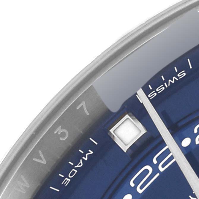 This image shows a close-up of the dial on a Rolex Sky-Dweller 326934 Men
s Stainless Steel Blue Dial 326934 Men
s Stainless Steel Blue Dial, focusing on the date marker and part of the bezel.