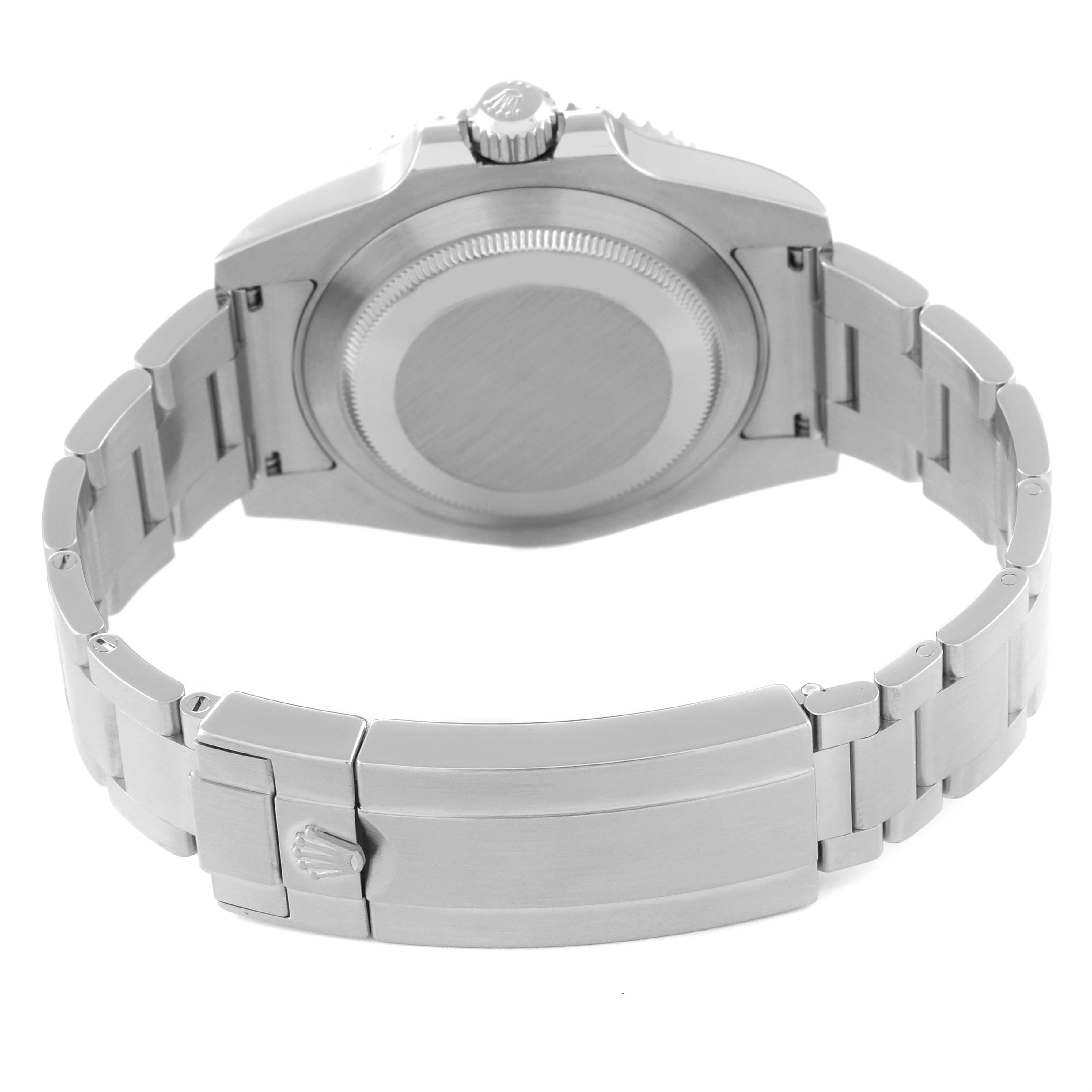 The image shows the back view of a Rolex Submariner 116610LV Men
s Stainless Steel Green Dial 116610LV Men
s Stainless Steel Green Dial watch, featuring the caseback, crown, and the metal bracelet with clasp.